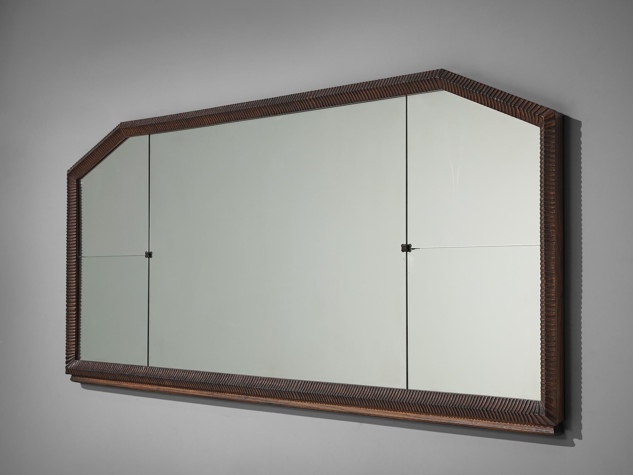 Ernesto Valabrega, console mirror, oak, metal, Italy, 1930s.

This large Art Deco mirror is designed by Ernesto Valabrega and can be placed on top of a sideboard or adjusted to a wall. The application of this elegant piece of furniture is a clever