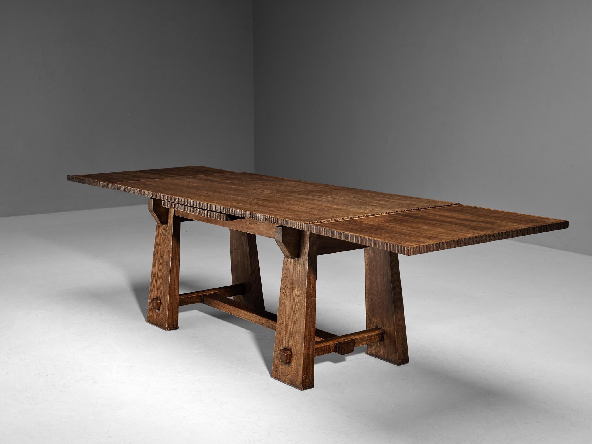 Ernesto Valabrega, dining table, oak, Italy, circa 1935 

Ernesto Valabrega once again proves his great eye for materialization and great craftsmanship this dining table is exemplary for. The table is architecturally built based on the assemblage of