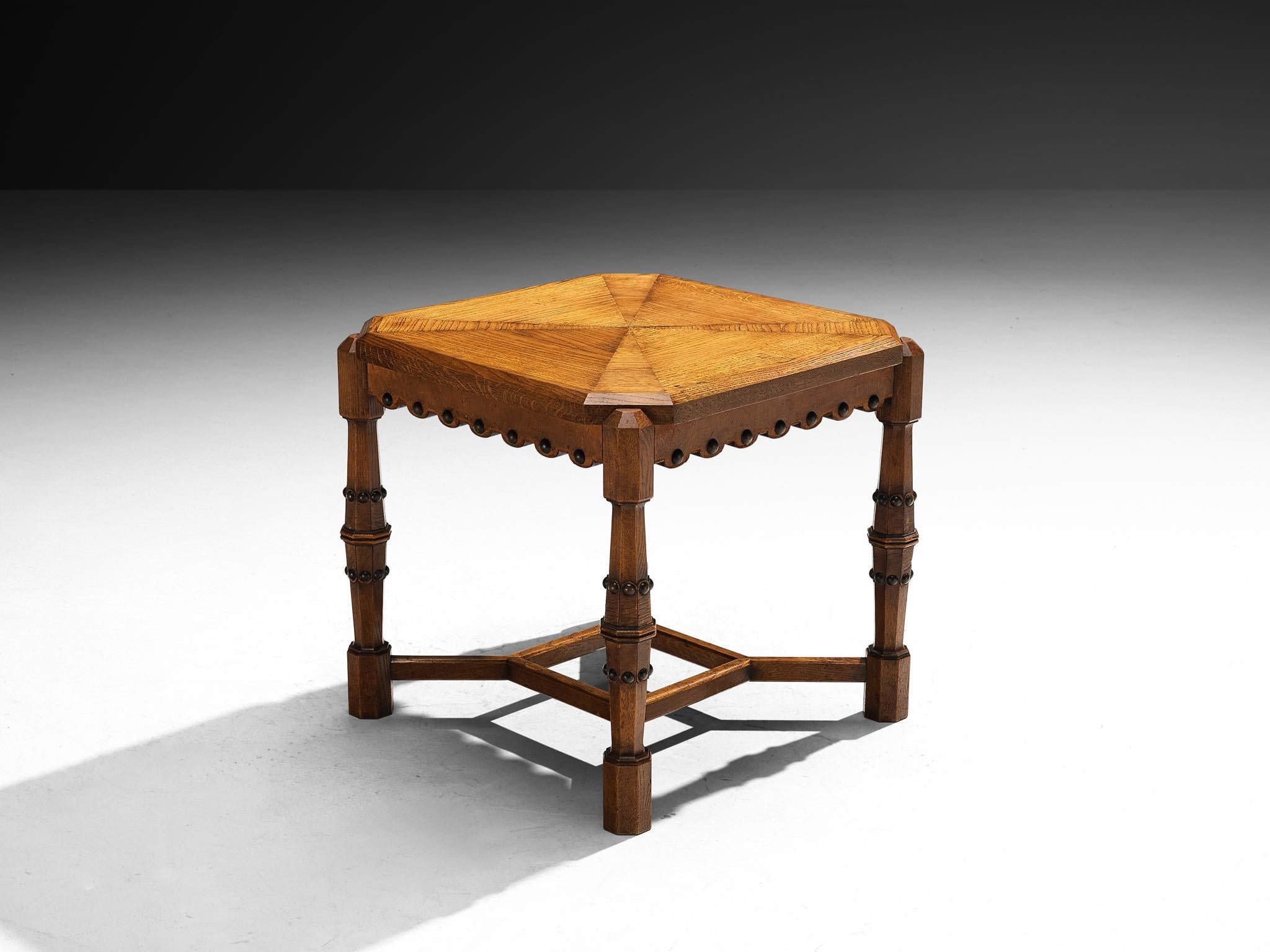 Ernesto Valabrega for Vittorio Valabrega, coffee or side table, solid oak, fabric, brass, Italy, 1930s

Coffee table designed by the Italian Ernesto Valabrega and meticulously crafted by the Vittorio Valabrega studio in the 1930s. Its square top