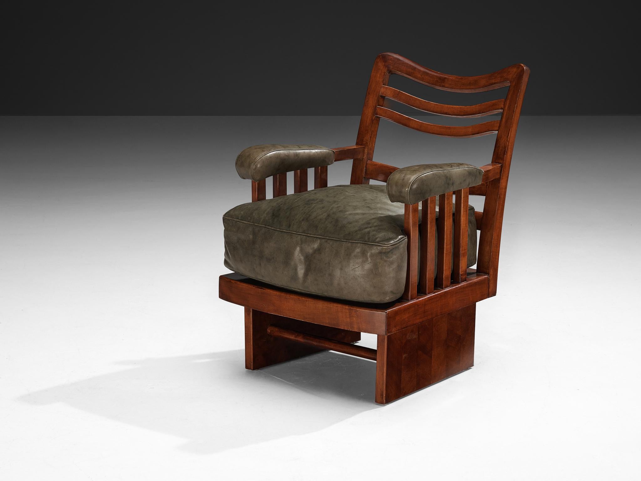 Ernesto Valabrega for Vittorio Valabrega, armchair, mahogany, cherry, leather, Turin, Italy, 1930s

This chair, designed by Ernesto Valabrega in the thirties, departs from a strict geometric design infused with organic details. The backrest features