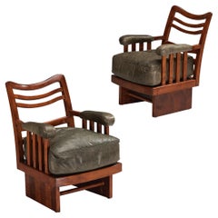 Ernesto Valabrega paire de chaises longues en cuir vert olive et acajou