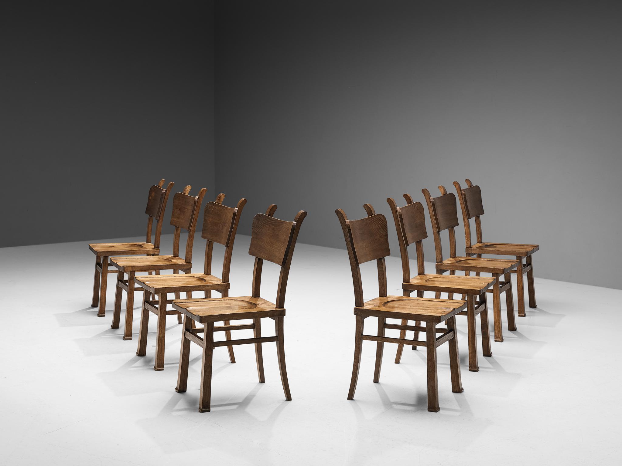 Ernesto Valabrega, set of eight dining chairs, oak, Italy, ca. 1935

These well-sculpted chairs embody an evolved rustic character with great quality of elegance and are created in one of the most influential periods for the arts namely the Art