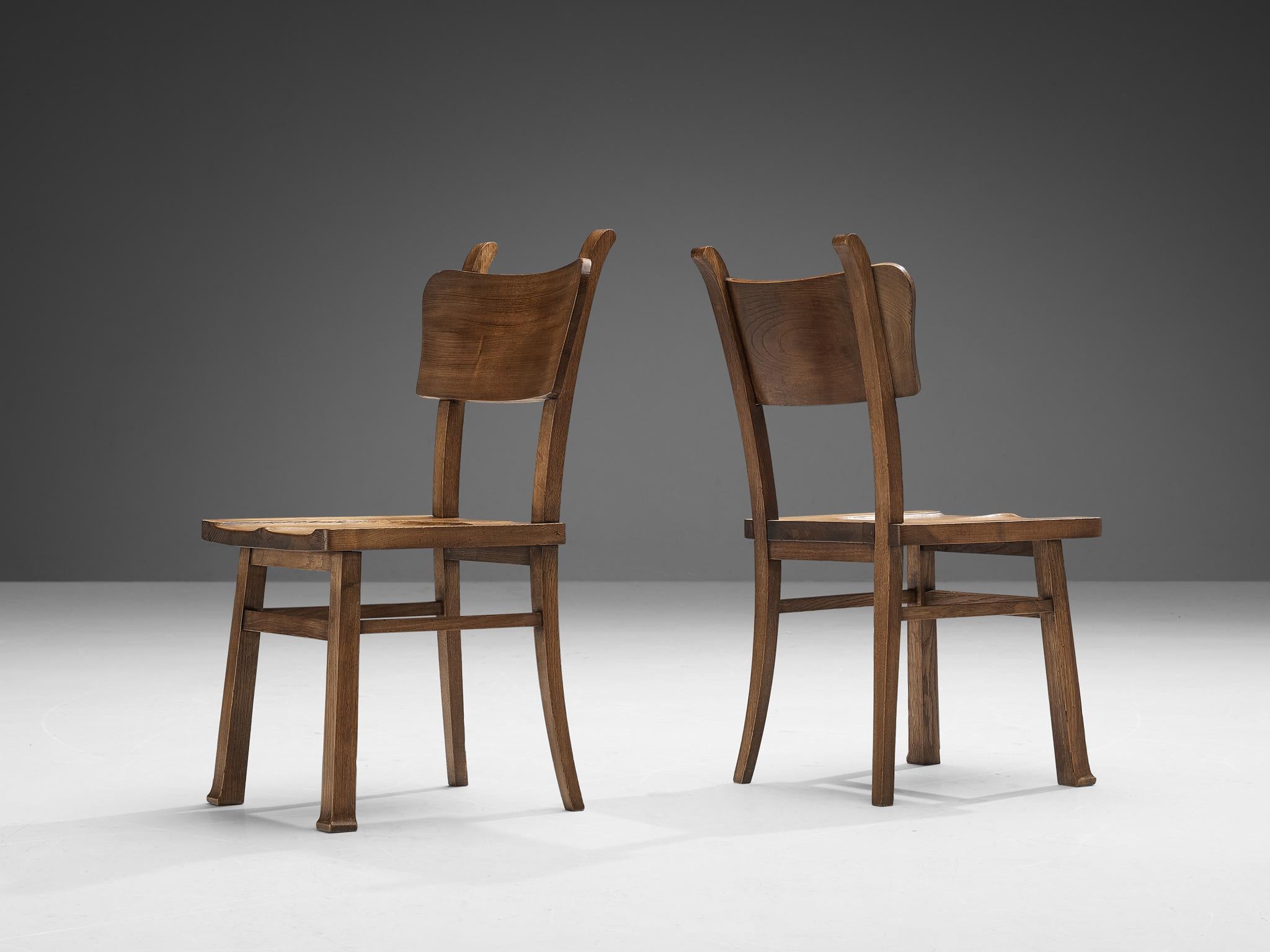 Mid-20th Century Ernesto Valabrega Set of Eight Dining Chairs in Oak