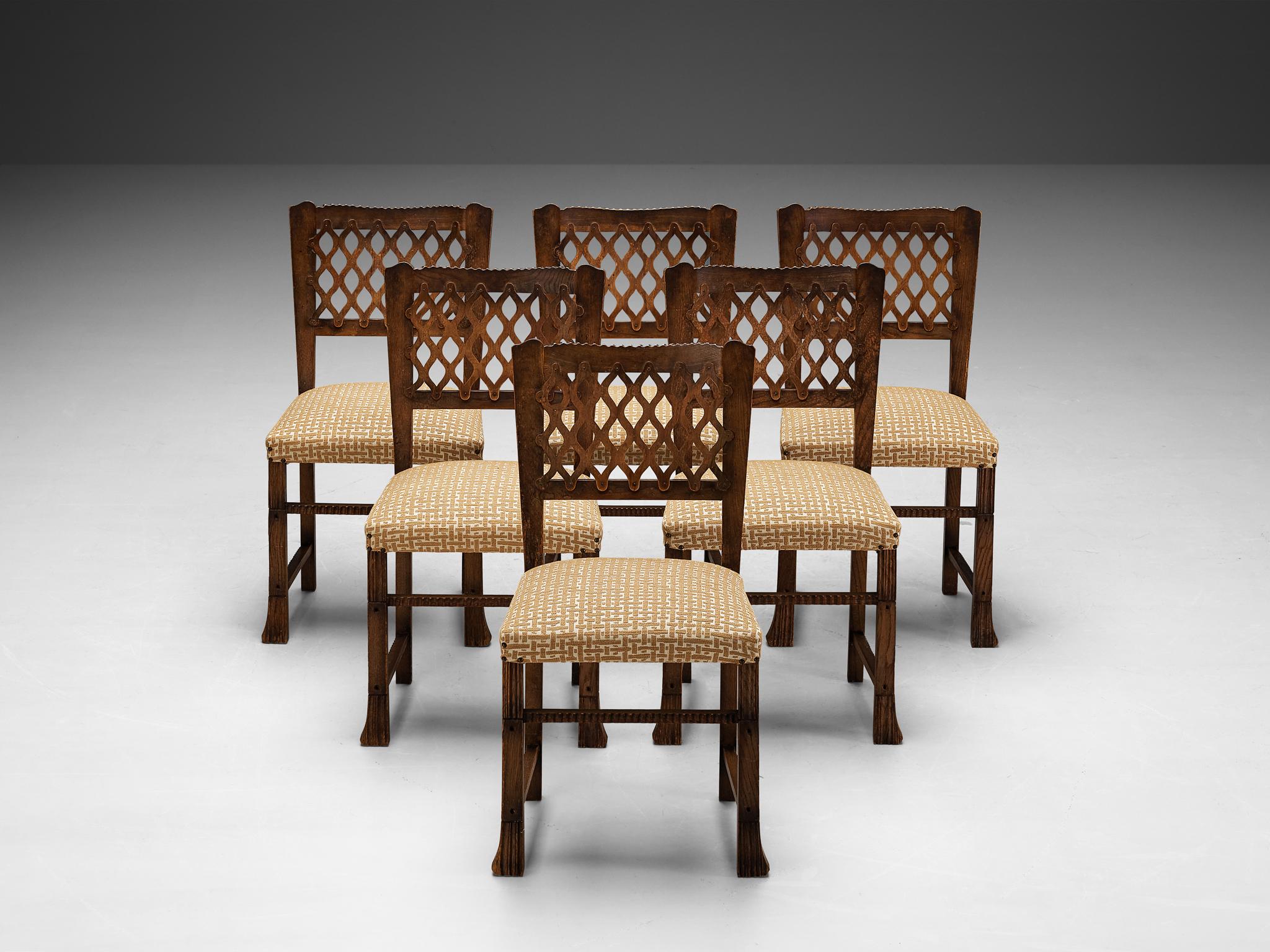 Ernesto Valabrega, set of six dining chairs, chestnut, fabric, Italy, circa 1935

These well-sculpted chairs are created in one of the most influential periods for the arts namely the Art Deco Movement. The chairs bear witness to the designer's