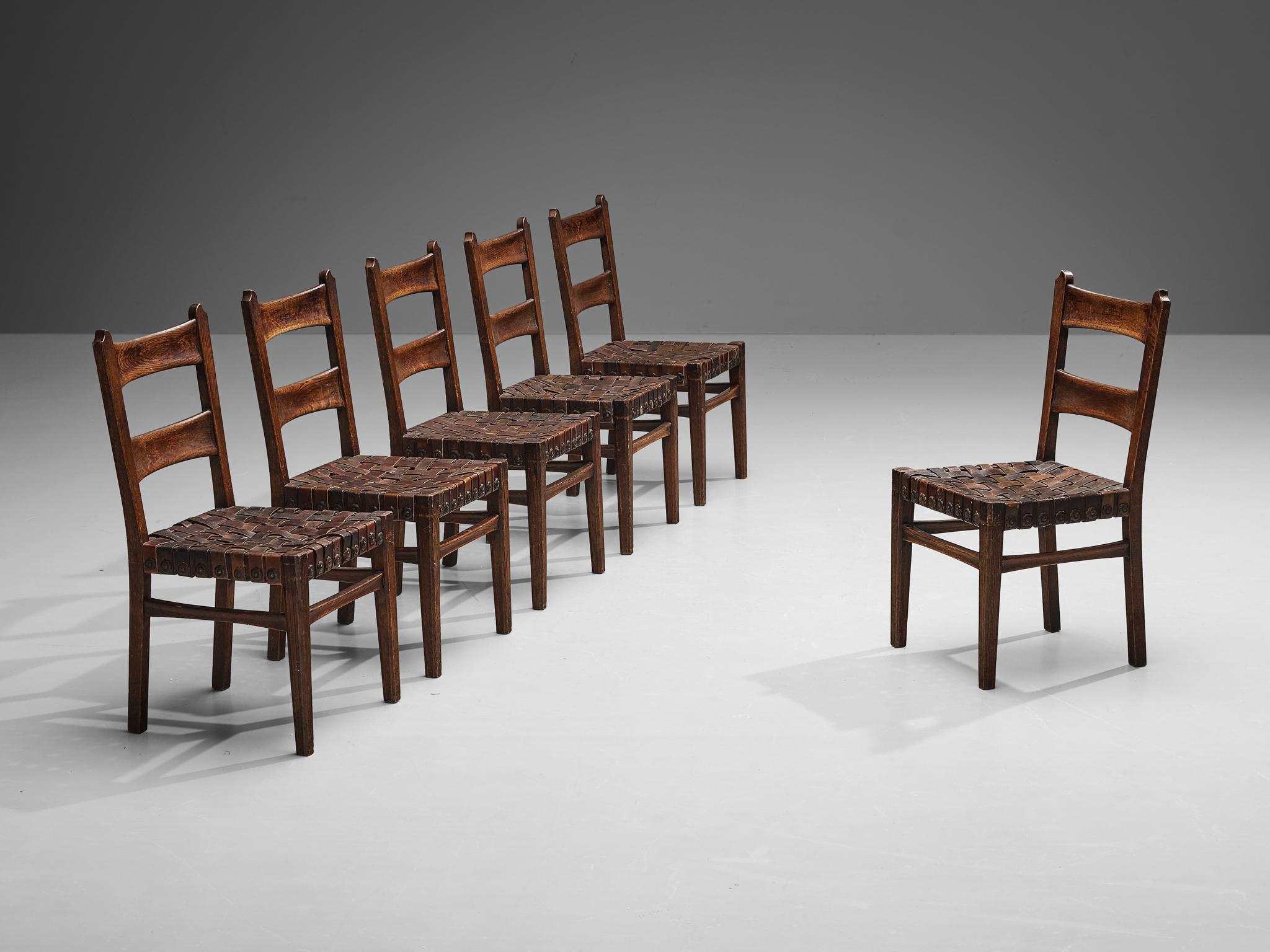 Ernesto Valabrega, set of six dining chairs, oak, leather, metal, Italy, 1930s

These well-sculpted chairs are designed by Italian Art Deco master Ernesto Valabrega. The chairs clearly reflect the designer's excellent taste for form and expert