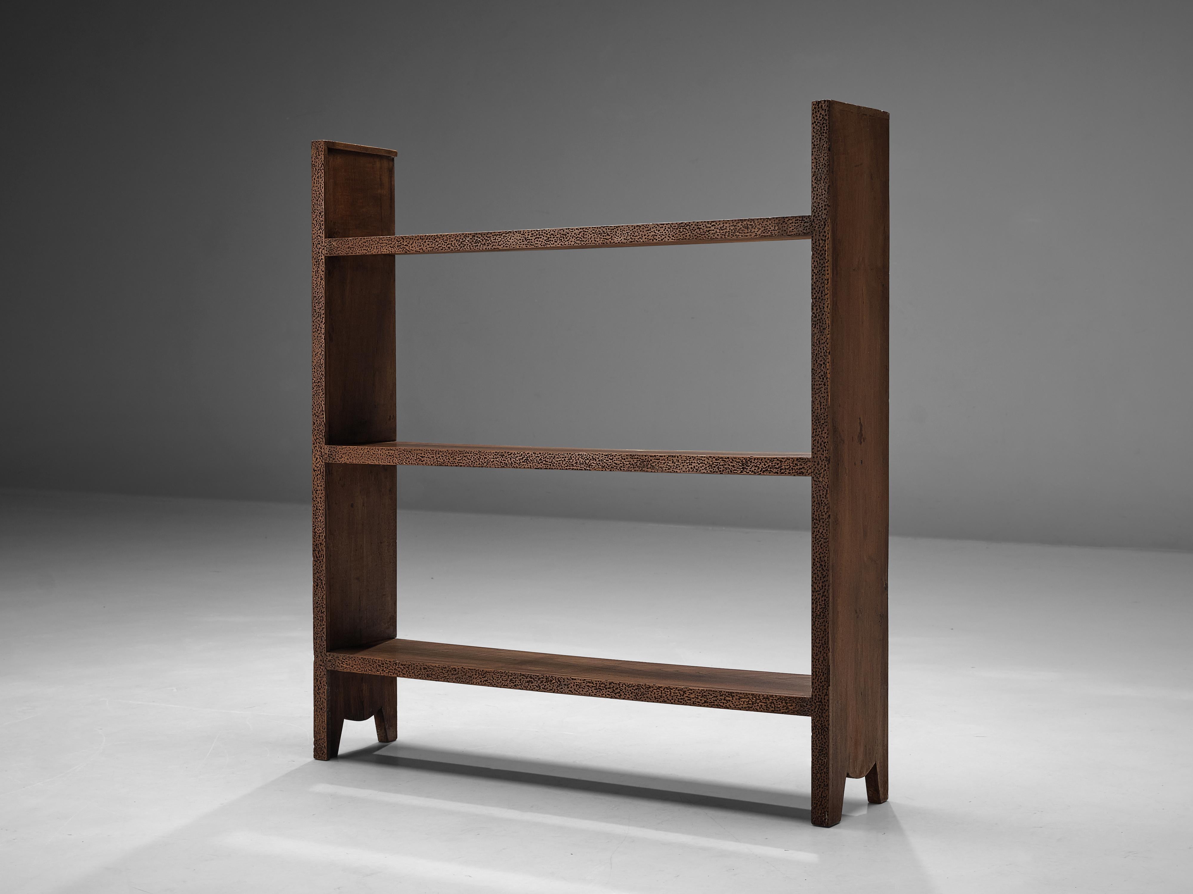 Ernesto Valabrega, bookcase, oak, Italy, 1930s

This bookcase shows the characteristics of Ernesto Valabrega's designs. The dynamic engraved wood, gives the piece real character. A nice detail are the small legs on each side of the shelves which
