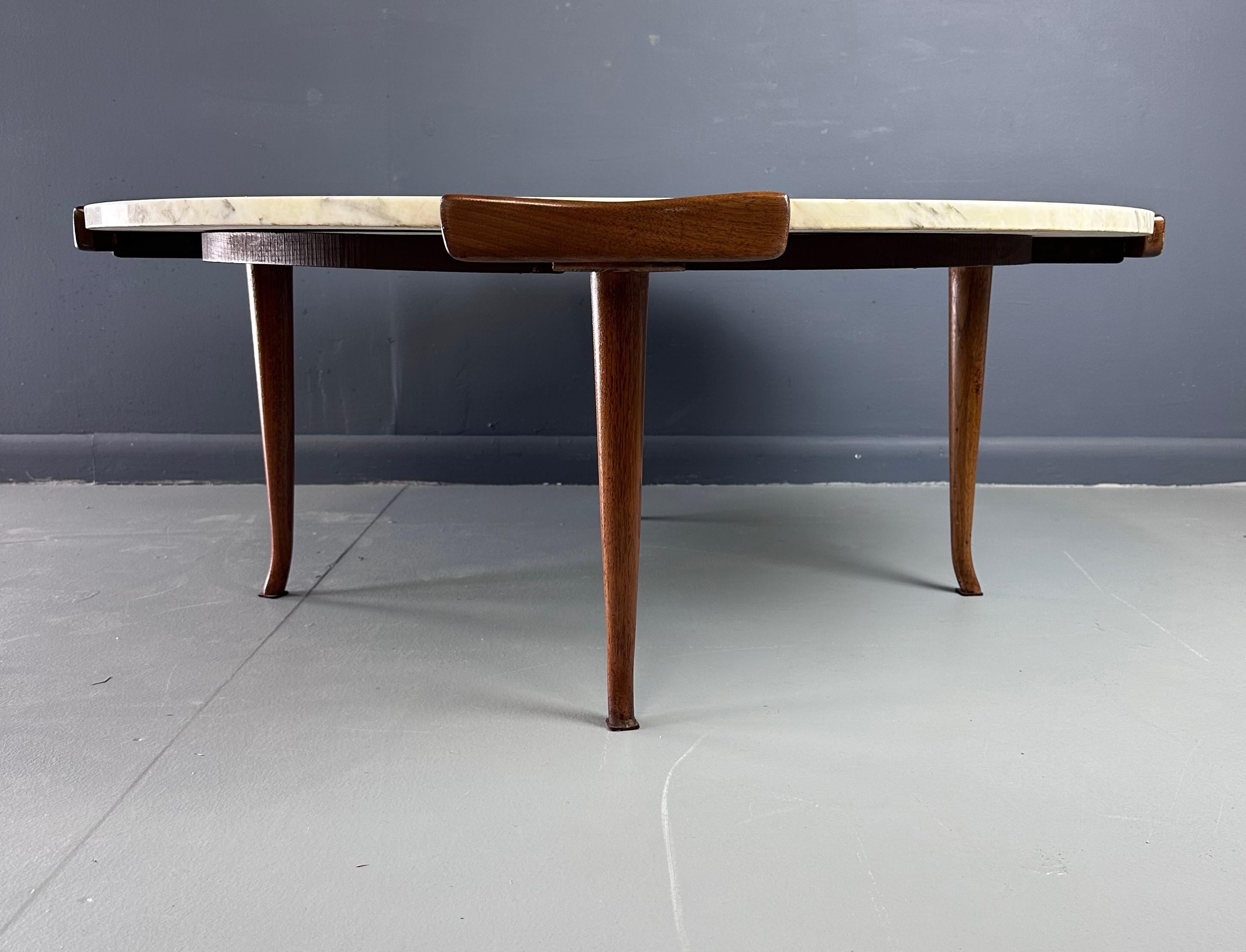 20th Century Erno Fabry Coffee Table in Carrara Marble and a Walnut Base with Curvacrous Legs For Sale
