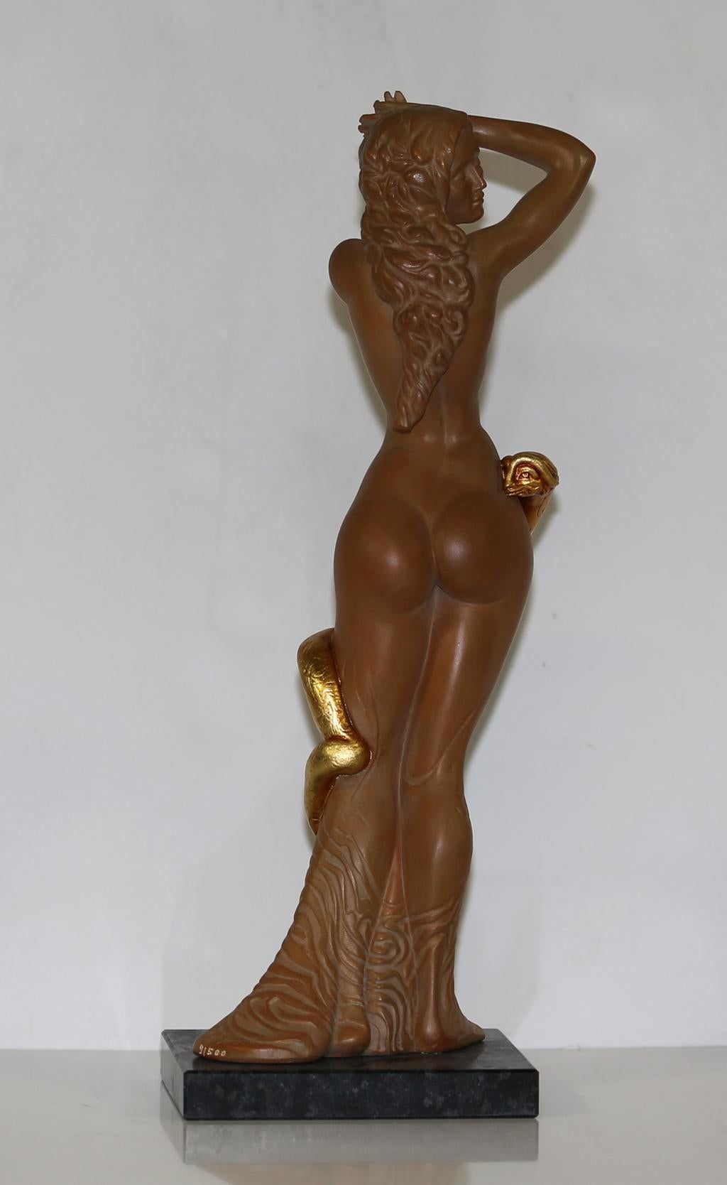 This sculpture made from polymer cast on a granite base, partially gold-plated, reimagines the biblical figure of Lot’s wife, who, according to Genesis 19, was turned into a pillar of salt for looking back at the destruction of Sodom. In her nude