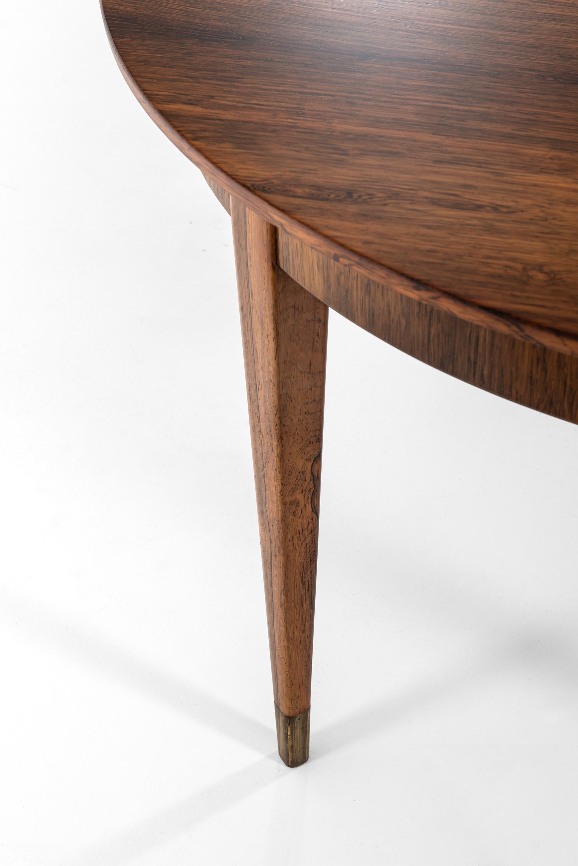 Mid-20th Century Ernst Kühn Dining Table in Rosewood by Lysberg Hansen & Therp in Denmark For Sale