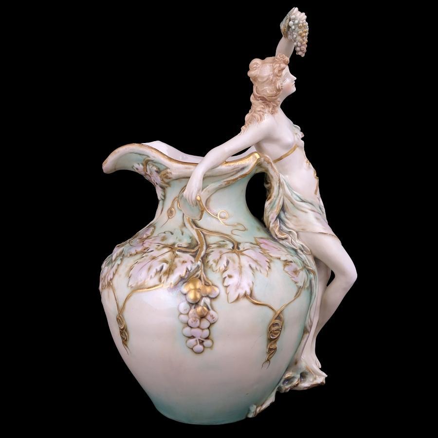 Beautiful Ernst Wahliss hand-painted classical porcelain vase. Vase is made in Teplitz (Austria) circa 1905 and is decorated in gold over light blue-green drip-glaze. Vase is signed, 