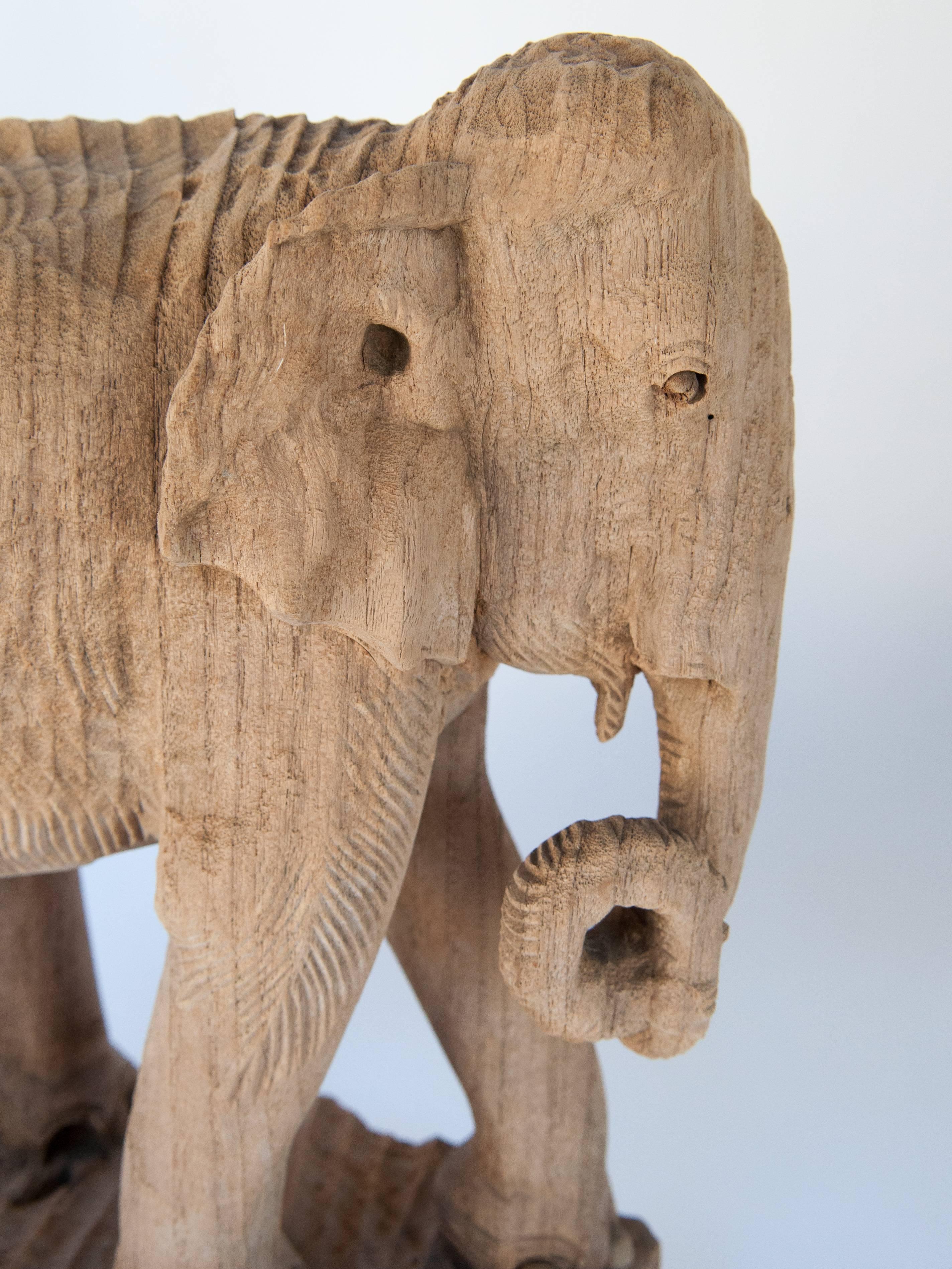 Eroded hand-carved elephant, teak wood, late 20th century, Northern, Thailand.
Offered by Bruce Hughes.
The weathered surface of this gracefully eroded hand carved teak wood elephant from Northern Thailand resulted from many years of exposure to