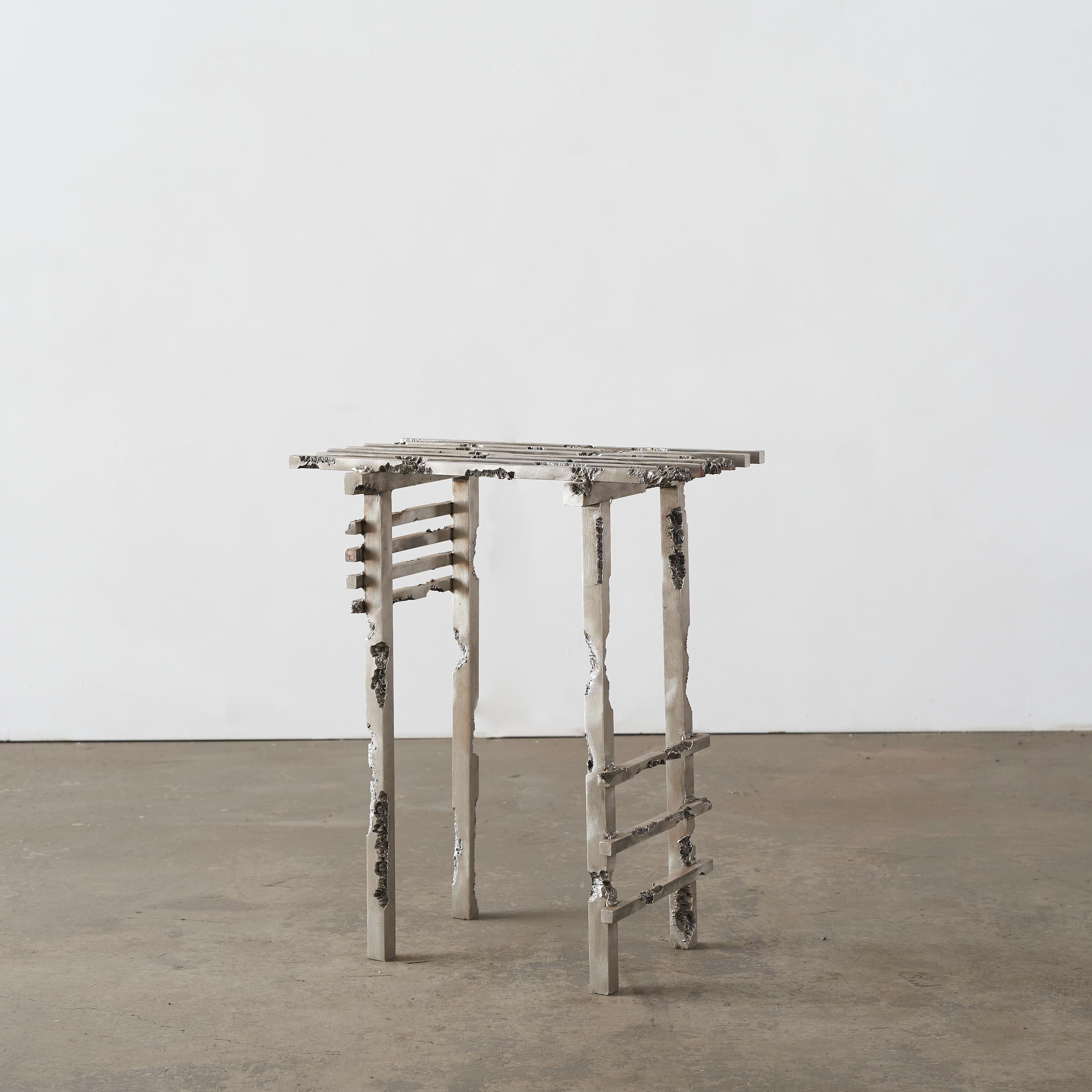 Eroded Side Table by Michael Gittings
One of a Kind
Dimensions: D 30 x W 30 x H 47 cm
Materials: Stainless steel.

Michael Gittings
Melbourne based designer Michael Gittings aims to Challenge pre-conceptions around furniture, creating contemporary,