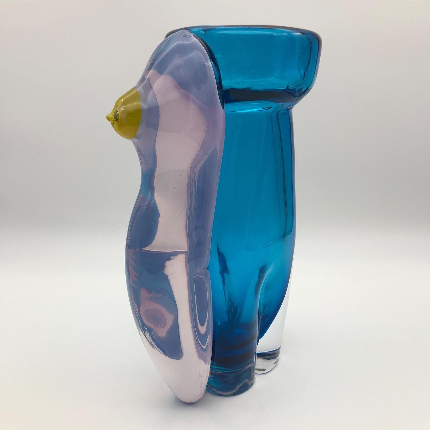 Named after the Greek God of Love, this magnificent vase will infuse a charming accent of contemporary flair in any decor. Deftly handcrafted by master glassmaker Toso Cristiano, it is fashioned of opaline ruby glass and aquamarine clear glass,