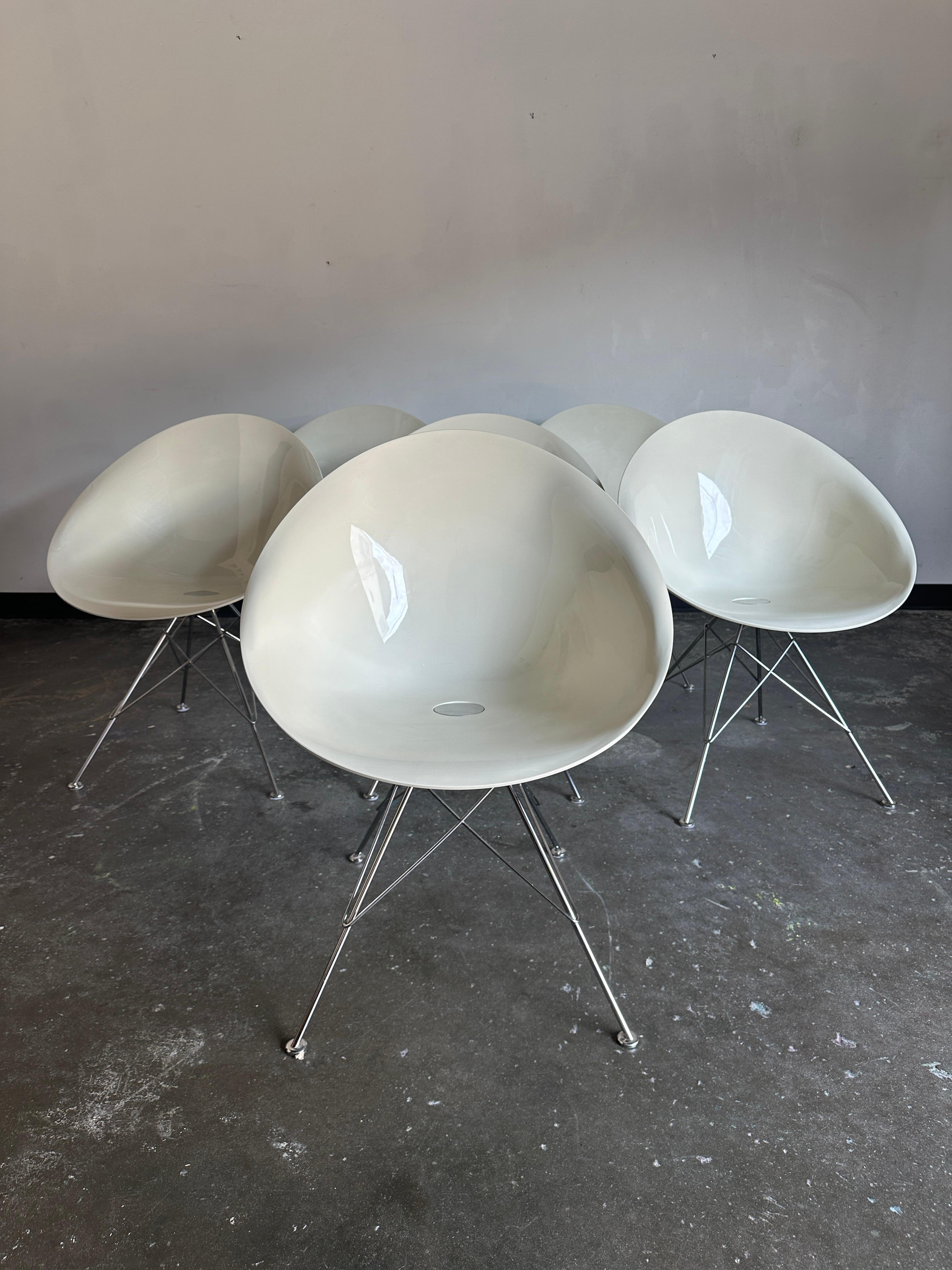 This listing is for a set of 6 Eros Armchairs by Philippe Starck for Kartell. Each chair is in excellent condition with minor age-consistent wear. These chairs like a hug and comfortable in the most unexpected way. The chairs pair perfectly with the