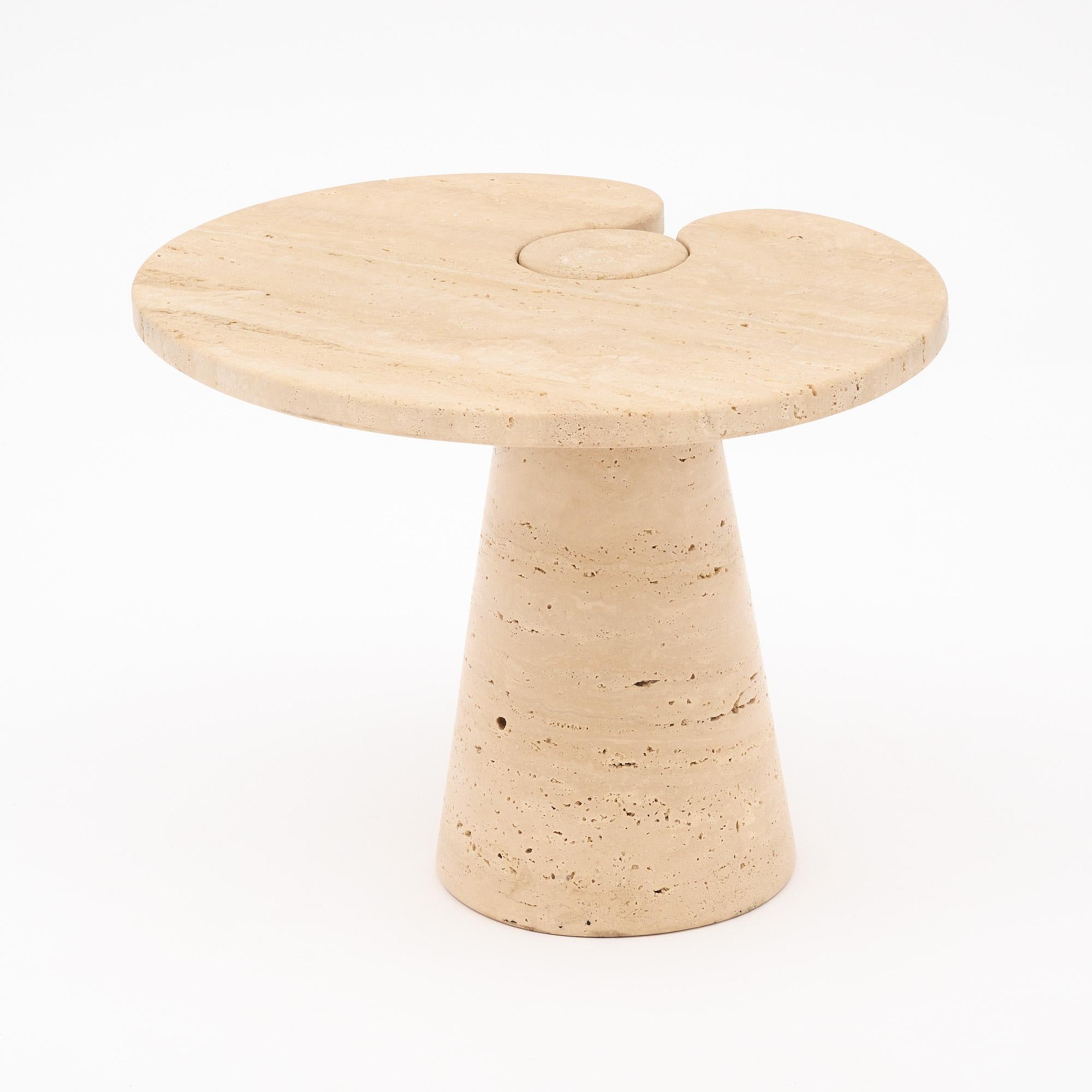 Single side table by Angelo Mangiarotti made of a striking cream toned travertine. Part of the Eros series and produced for Skipper, Italy 1970s. The top fits perfectly on the base for a seamless design.

