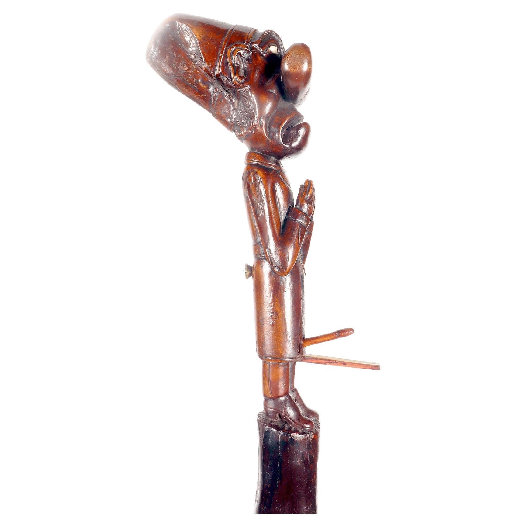 Erotische Volkskunst  walking stick, der einen Mann im Akt des Gebets darstellt, England 1850. im Angebot
