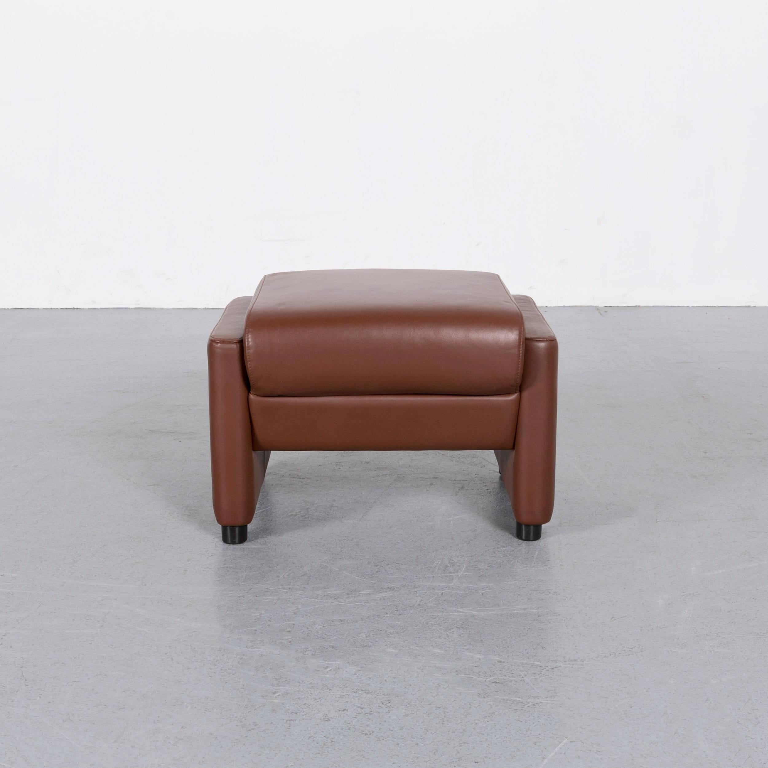 Erpo designer footstool leather brown, in a minimalistic and modern design, made for pure comfort.