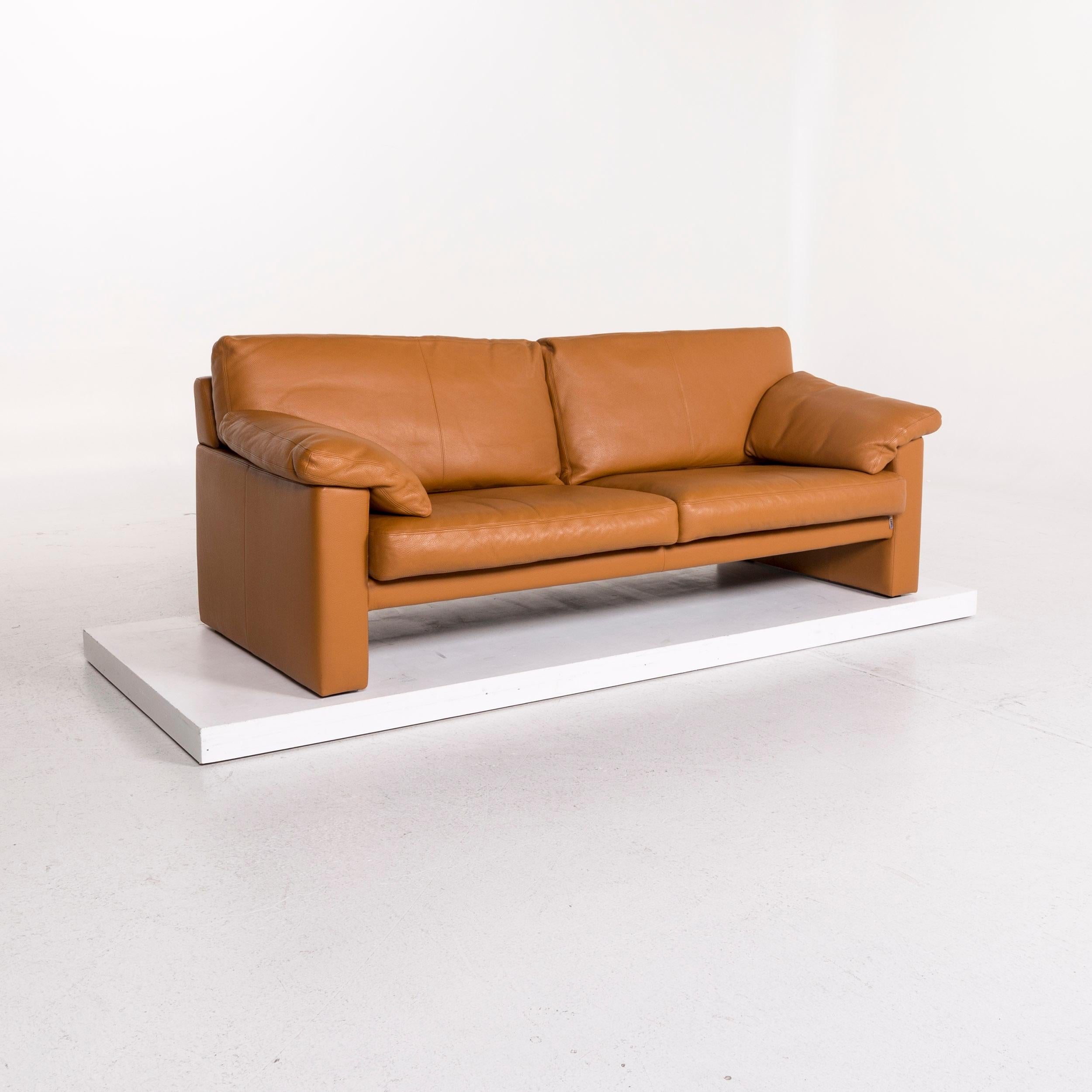 We bring to you an Erpo leather sofa cognac brown two-seat couch.


 Product measurements in centimeters:
 

Depth 91
Width 188
Height 68
Seat-height 41
Rest-height 61
Seat-depth 54
Seat-width 139
Back-height 40.
 