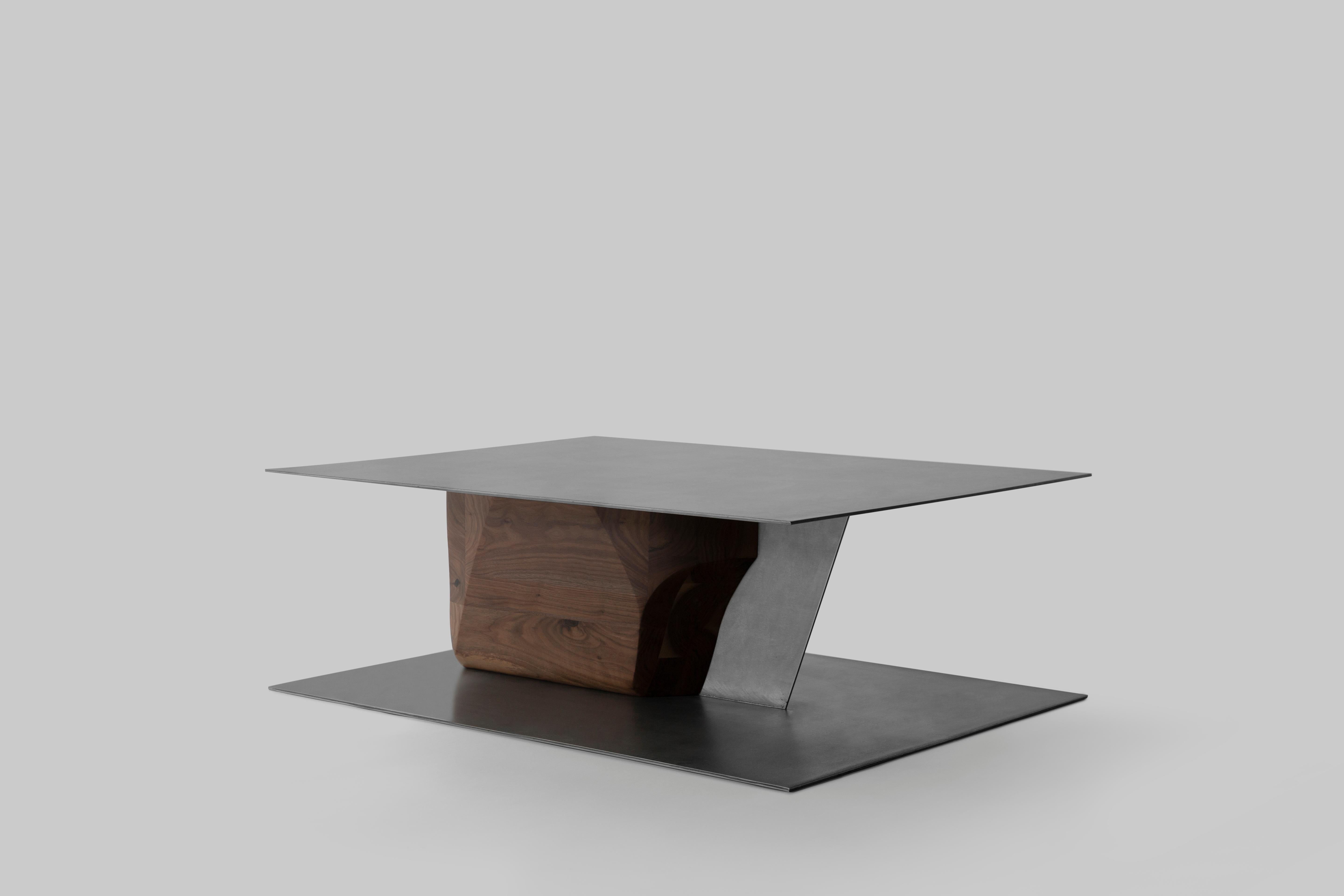 Erro coffee table by Regina Merino and Rodrigo Ordóñez
Dimensions: D 120 x W 90 x H 41 cm
Materials: steel, walnut wood.

Coffee table made of steel plate with solid walnut wood.

Part of the internal design team at Breuer, Regina Merino and