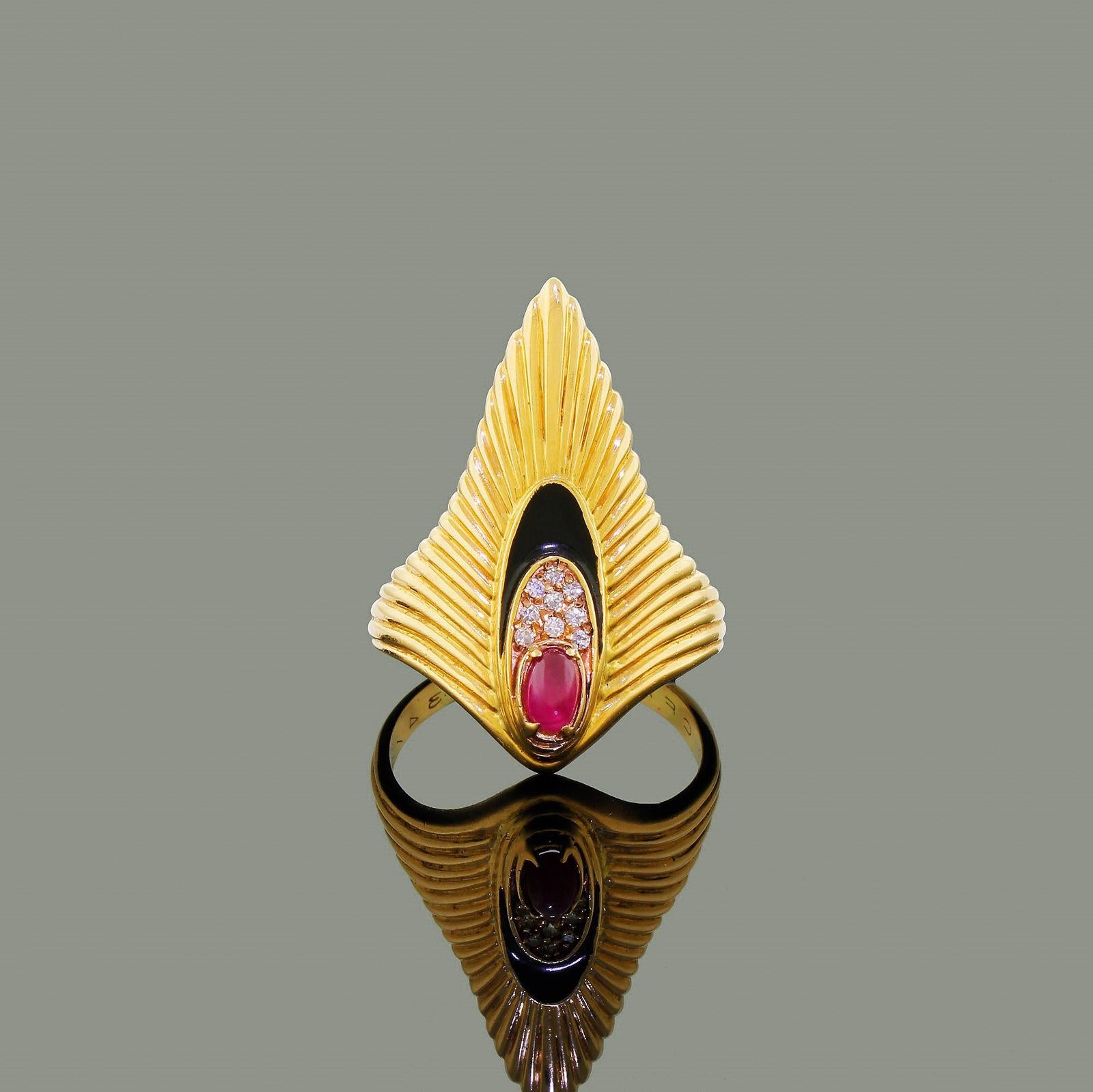 Outstanding limited edition Erte 14k gold Rayonnement Peacock ring of which this is 234 / 250.
What is unusual about this piece is the size, it is a larger USA 9.5 which is virtually unheard of in high end designer pieces 
The front of the ring