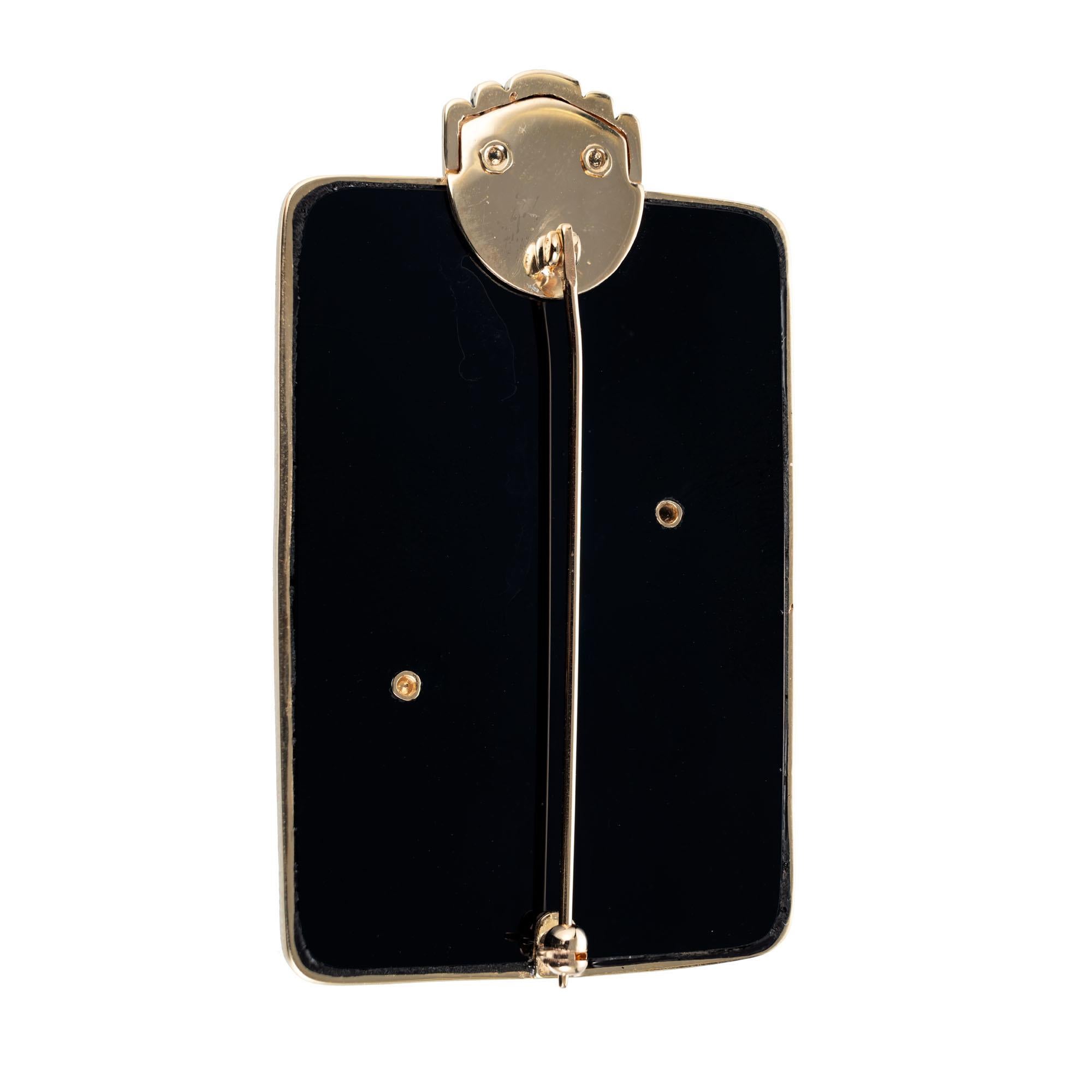 Art to Wear letter A brooch made of 14k yellow gold and black onyx frame with 39 round single cut accent diamonds made by Circle Fine Art, 1985.

20 round brilliant cut diamonds, H VS approx. .20cts
19 single cut diamonds, H VS approx. .10cts
14k