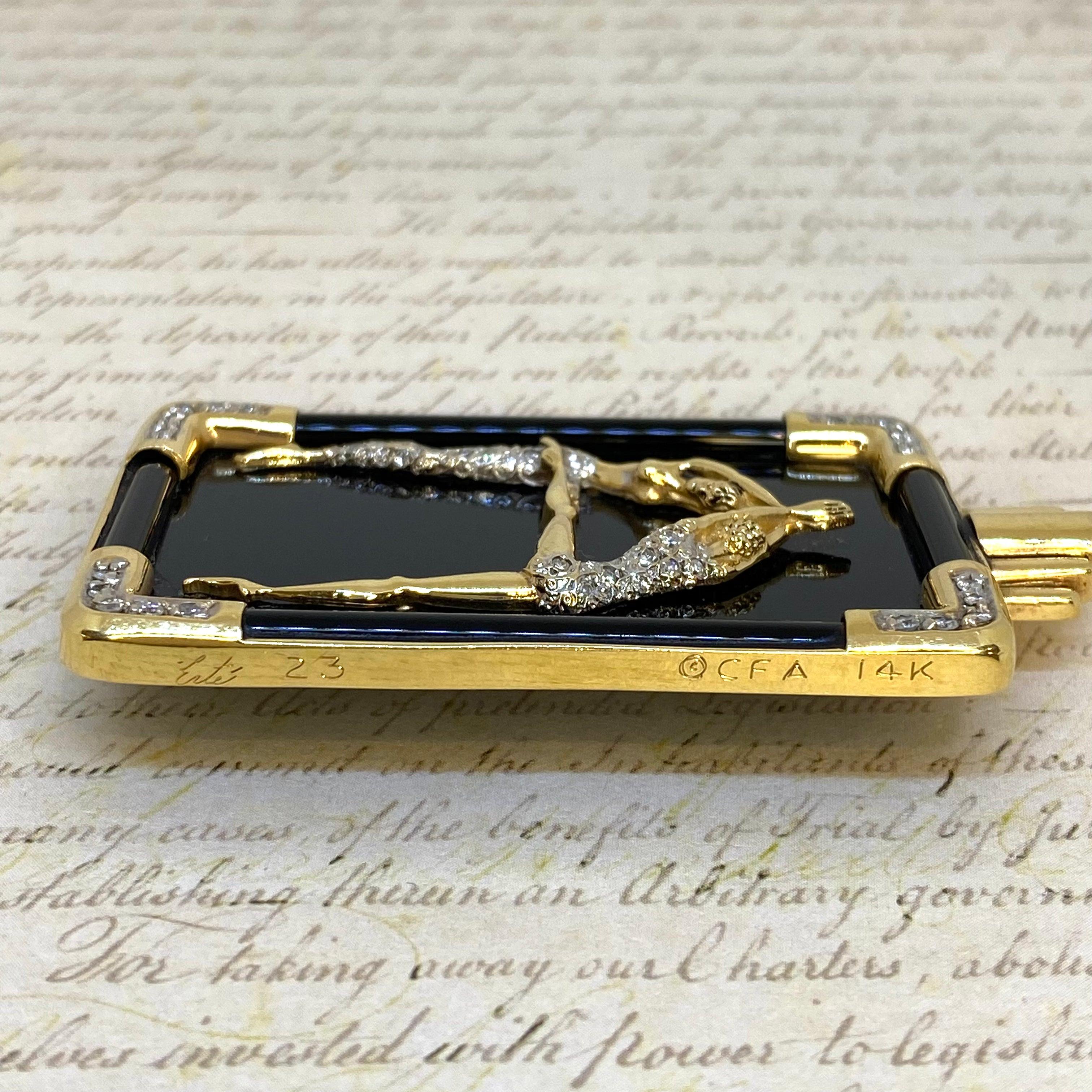 Amazing Erte' black onyx and diamond brooch, featuring the letter 