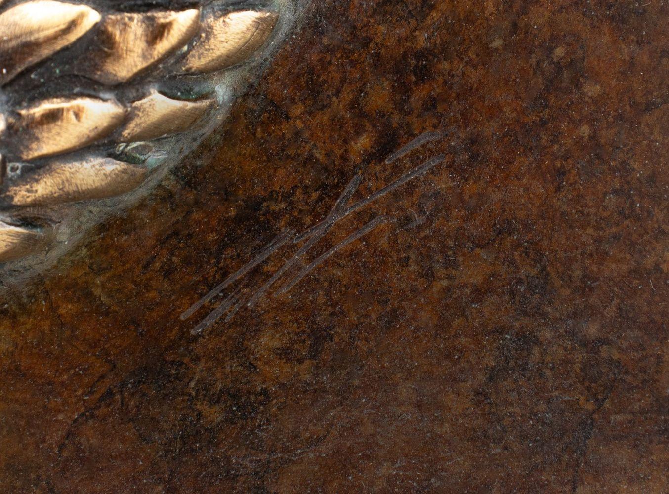 Escultura de bronce patinado 
