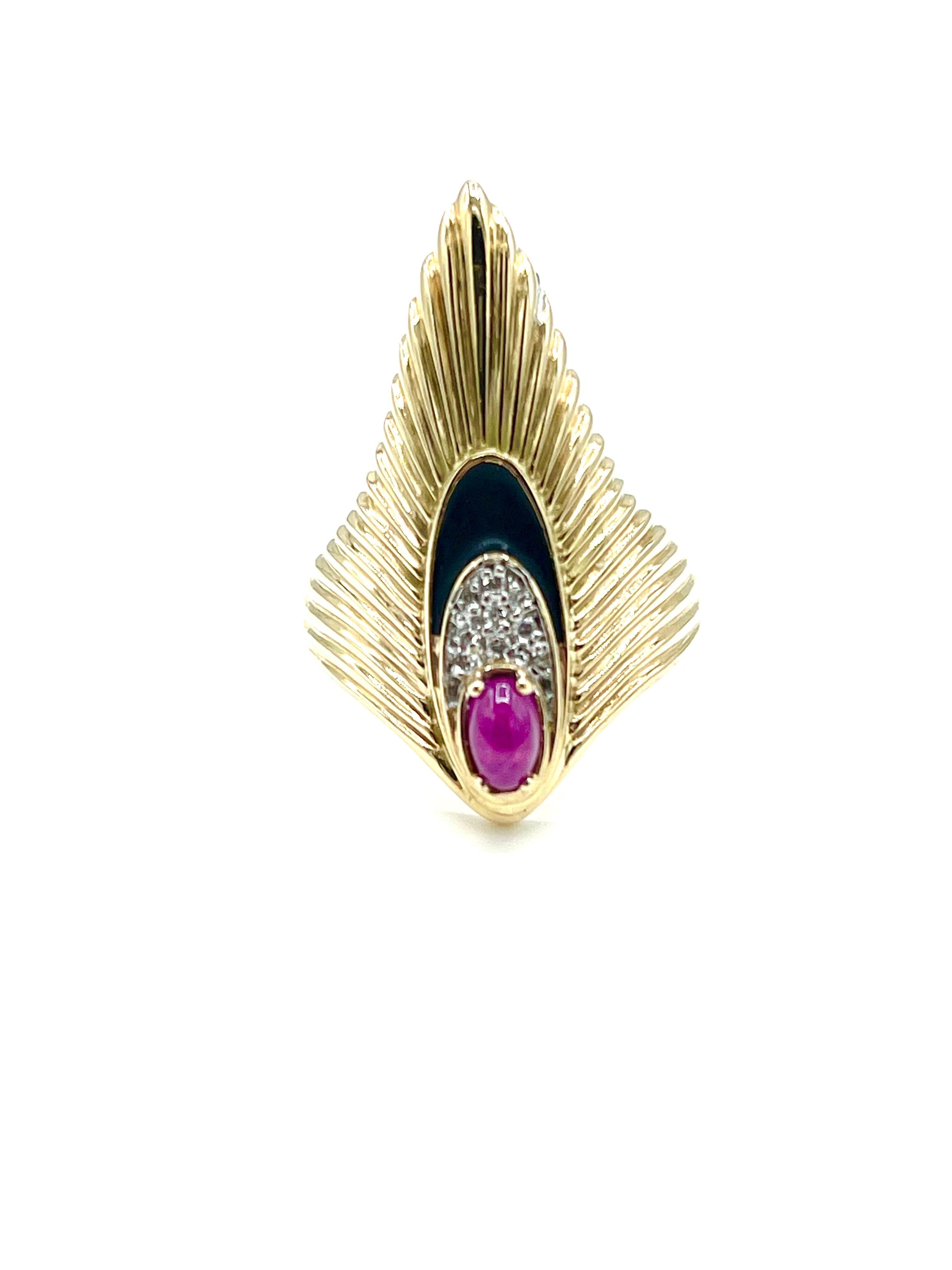 An elegant cocktail ring by designer Erte.  The ring features a cabochon cut Ruby, with round single cut Diamonds and black enamel , set in 14K yellow gold.  The inside of the ring is signed 