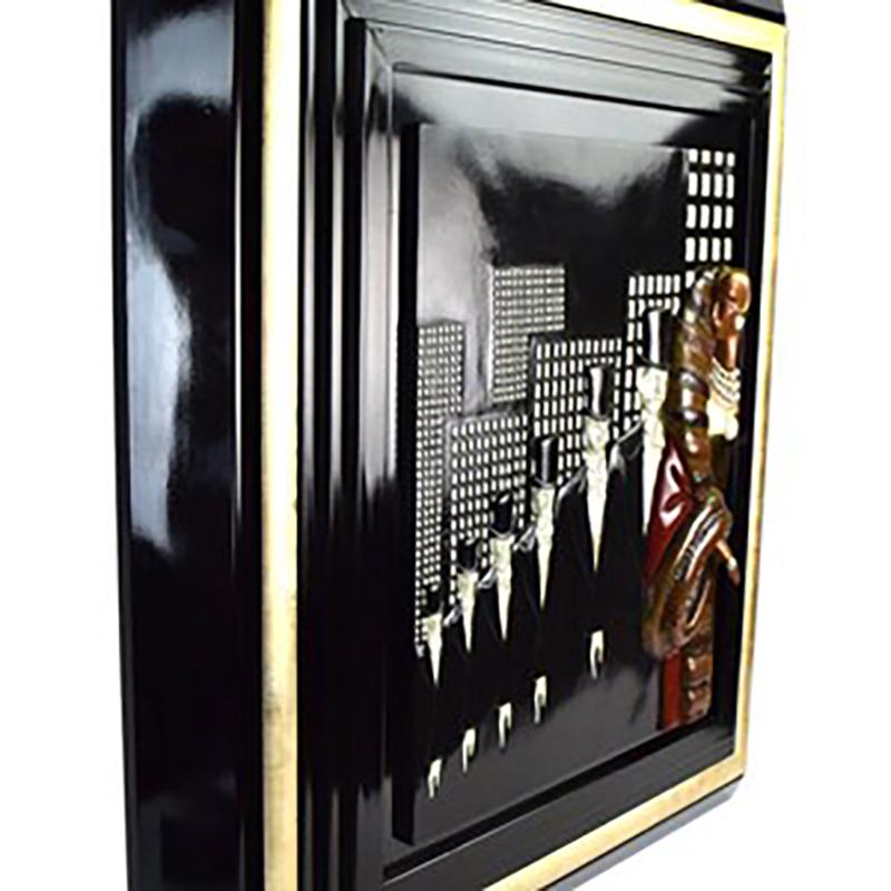 Artist:  Erte
Title: Top Hats 
Size: 16 x 12 Inches (26 x 22 Inches Framed)
Medium: 3D Bronze Wall Relief Sculpture
Edition:  of 375 
Year:  1990-1999
Notes: Hand Signed by Artist (Lower Right)and Numbered. Custom Framed
About:  Romain de Tirtoff,