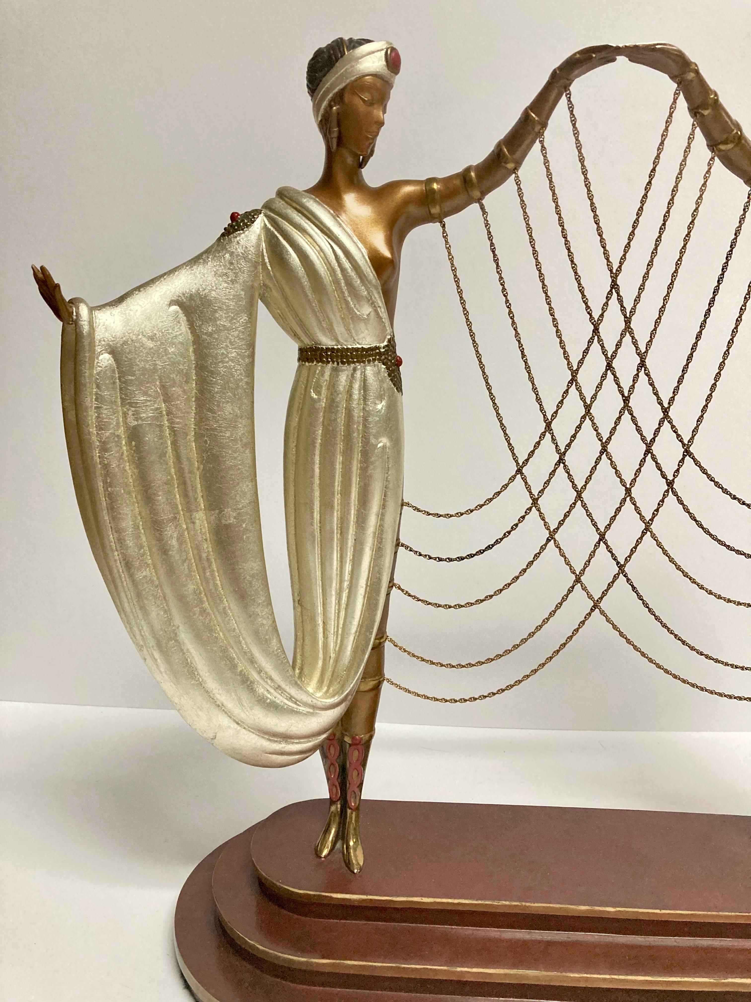 This is an Erte 1986 original bronze “wedding” signed and numbered . In good condition measures 15x18x5