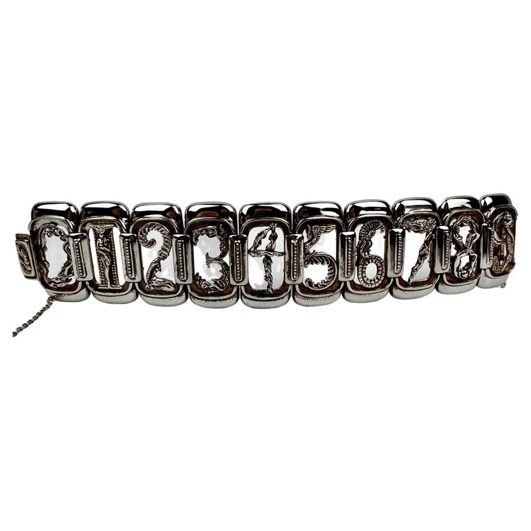 Sterling Silver Figural Numbers Bracelet by and marked Erté  For Sale