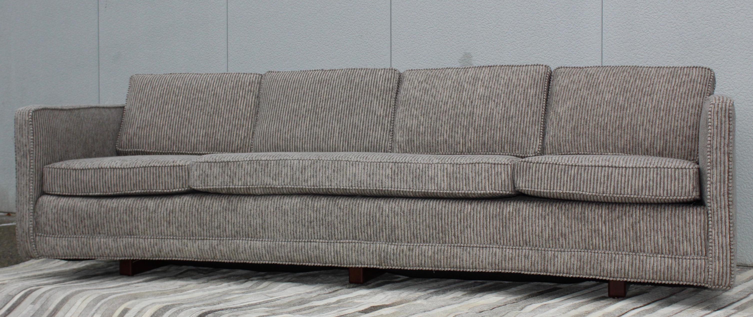 Stunning 1960's Mid-Century Modern long curved custom made sofa designed by Erwin Lambeth, fully restored and reupholstered in Donghia fabric, the sofa is well made very heavy and comfortable.