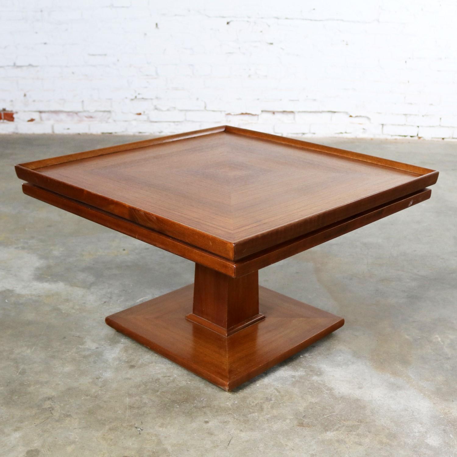 Handsome square midcentury walnut pedestal side table, end table, or lamp table by Erwin Lambeth. This table is in fabulous vintage condition. It does have some minor nicks as you would expect with age, but they do not detract from the beauty of