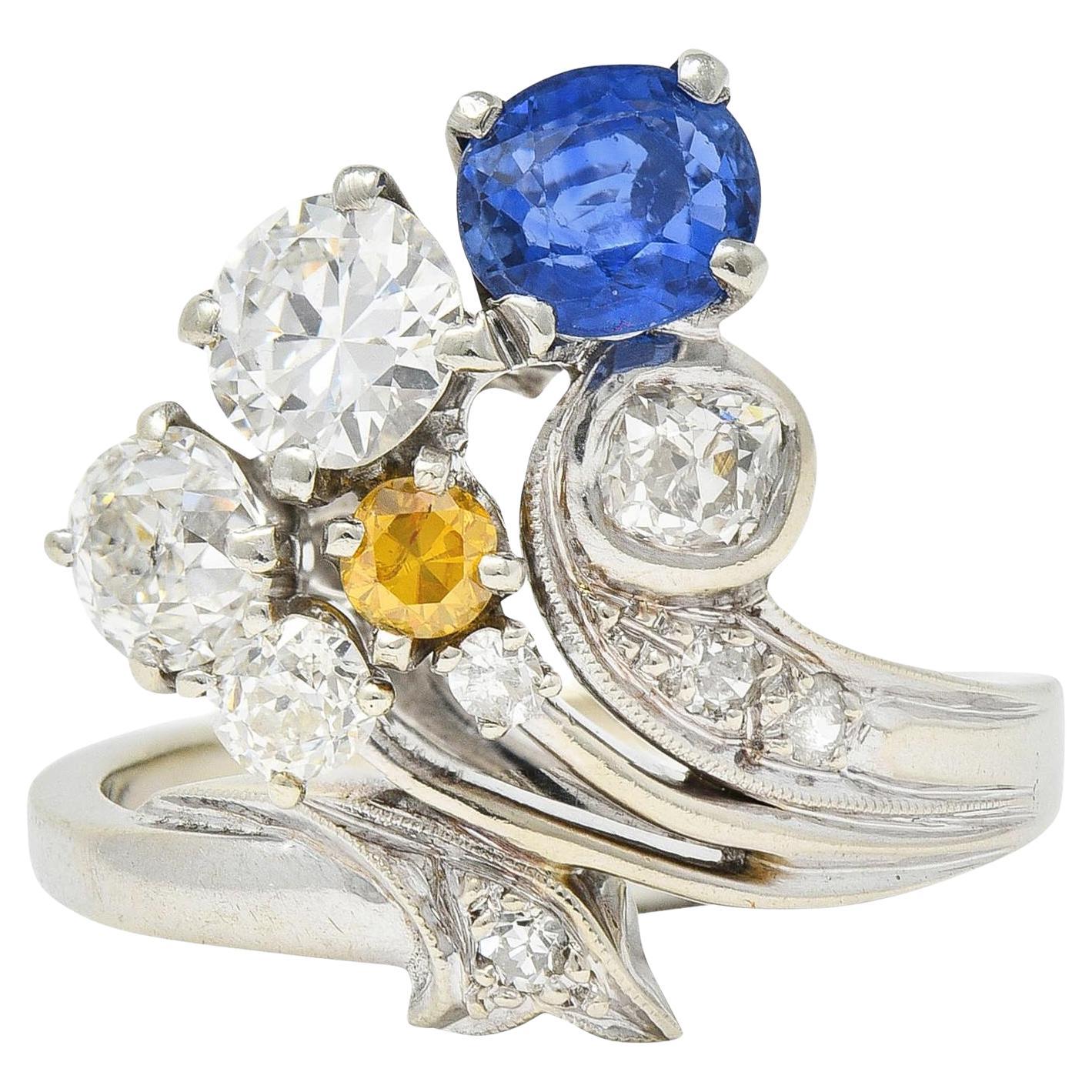 Erwin Reu Co. Mid-Century 2.03 CTW Sapphire Diamond 14 Karat Gold Bypass Ring For Sale