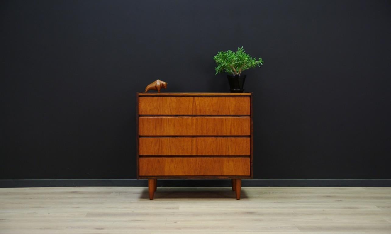 Chest of drawers from the 1960s-1970s, minimalist form, covered with rosewood veneer, produced in ES Møbler Silkeborg. Danish design. Chest has four drawers. Preserved in good condition (minor scratches and bruises) - directly for