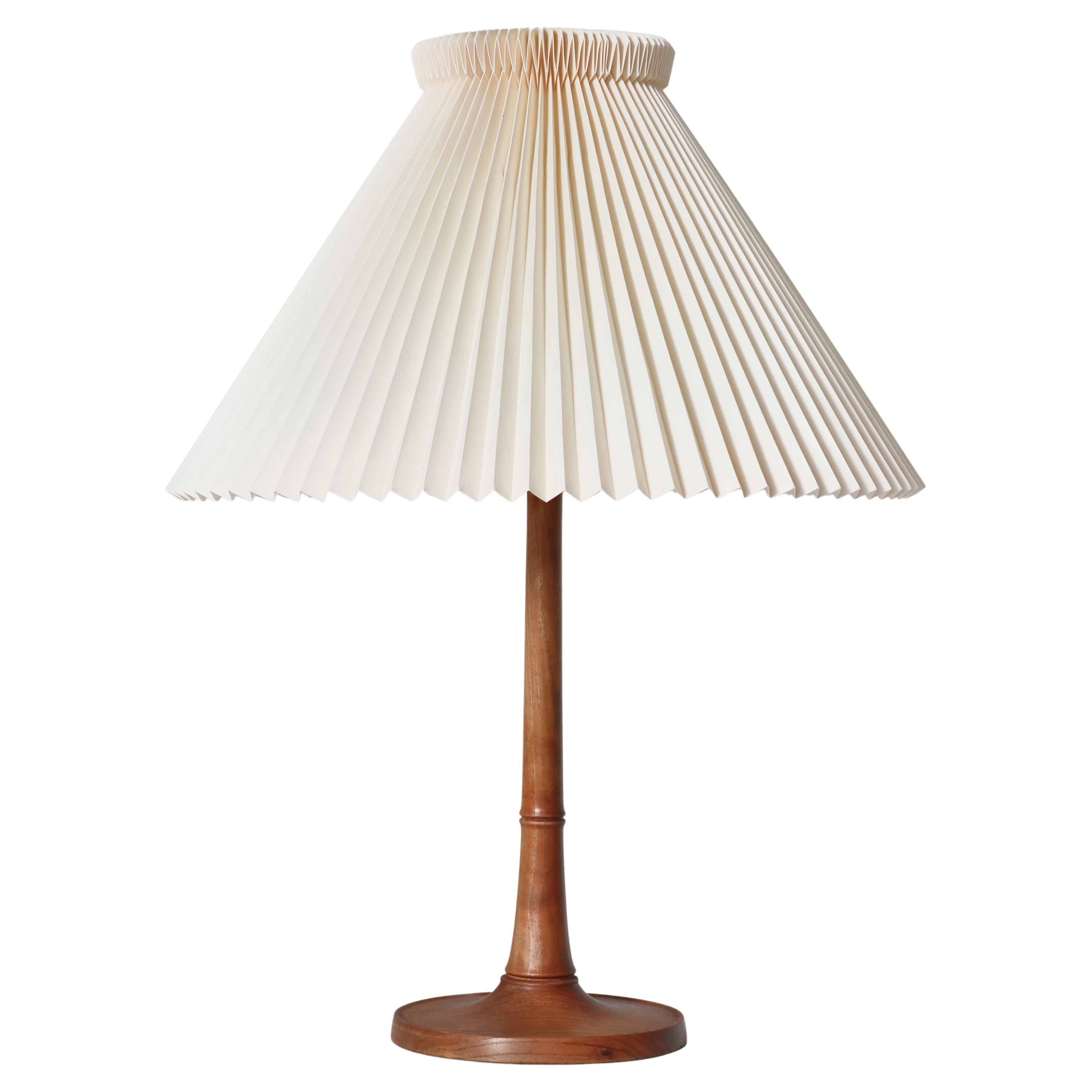 Kaare Klint Table Lamp in Ash Wood and Hand Folded Le Klint Shade, Denmark 1940s For Sale