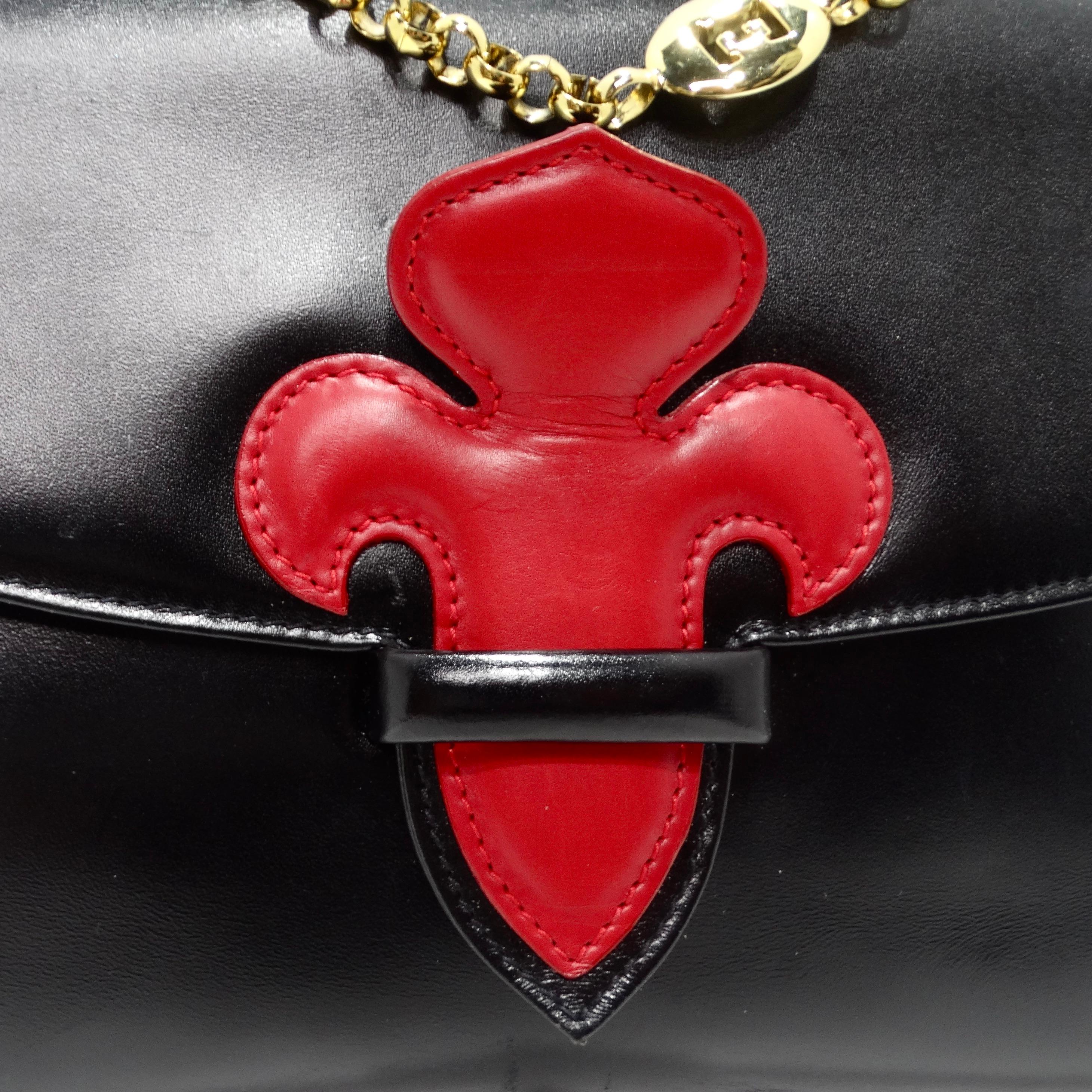 Get your hands on a handbag that is not only an accessory but a work of art - the Escada 1980s Fleur De Lis Black Leather Handbag. This vintage black leather handbag combines classic elegance with a unique design, making it a striking and beautiful