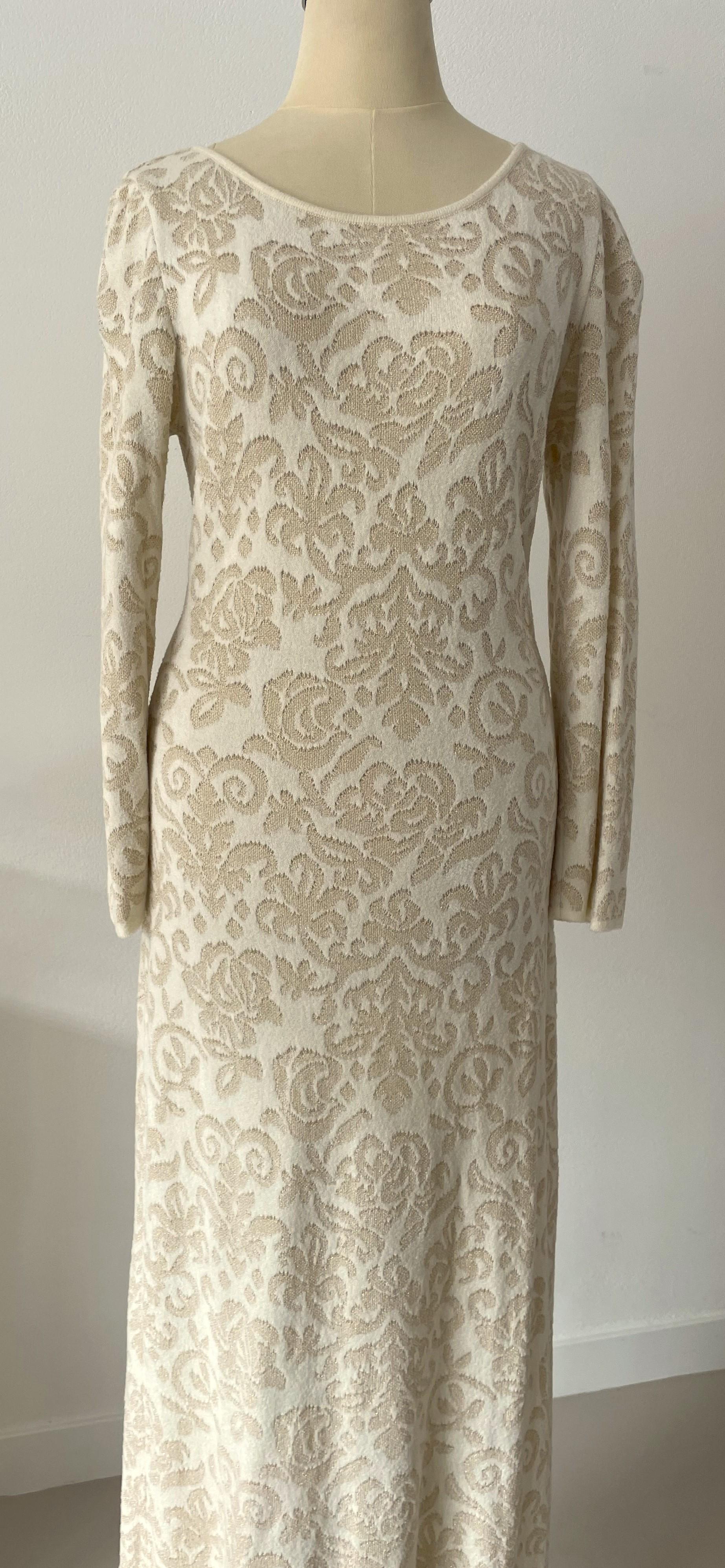 A Winter Wonderland stunning long dress designed by Margaretha Ley, paired with a long cardigan from Escada. 
Made from fabrics like cotton, nylon, viscose, and acetate. 
A luxurious, elegant outfit with both comfort and style.
Escada is known for
