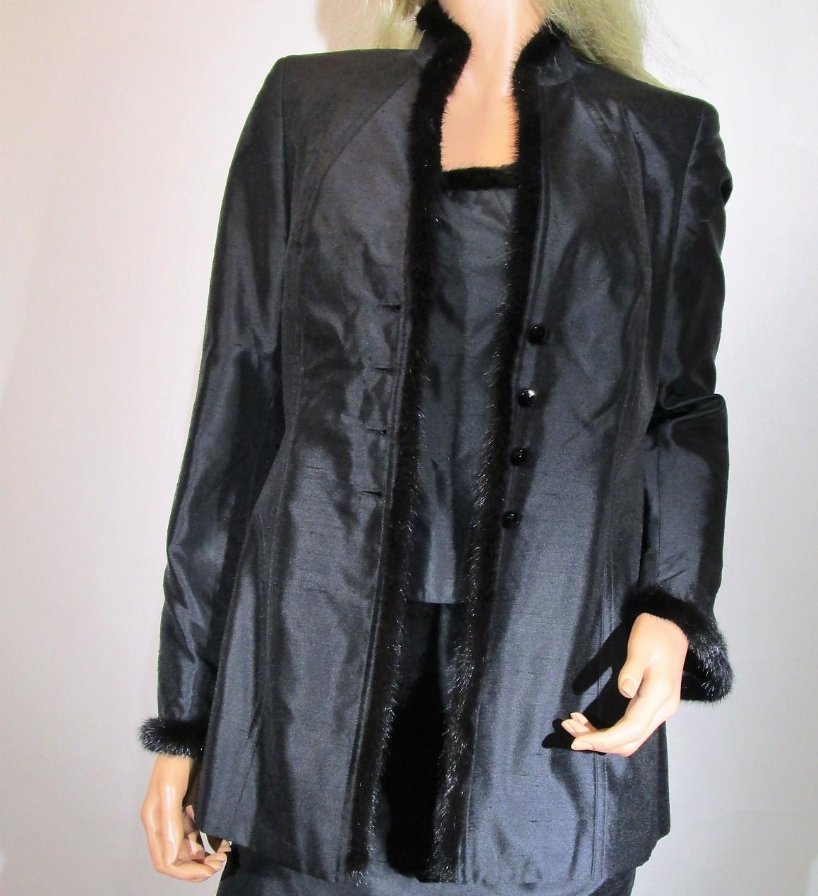 Vintage ESCADA Black Blazer, Skirt and Tank Top with amazing Black MINK trim detail on the blazer and top. 
Gorgeous classic design and made in Germany.
Outfit is in mint condition with no stains, holes or snags.

Details:
*Size 36 or USA Size 6 -