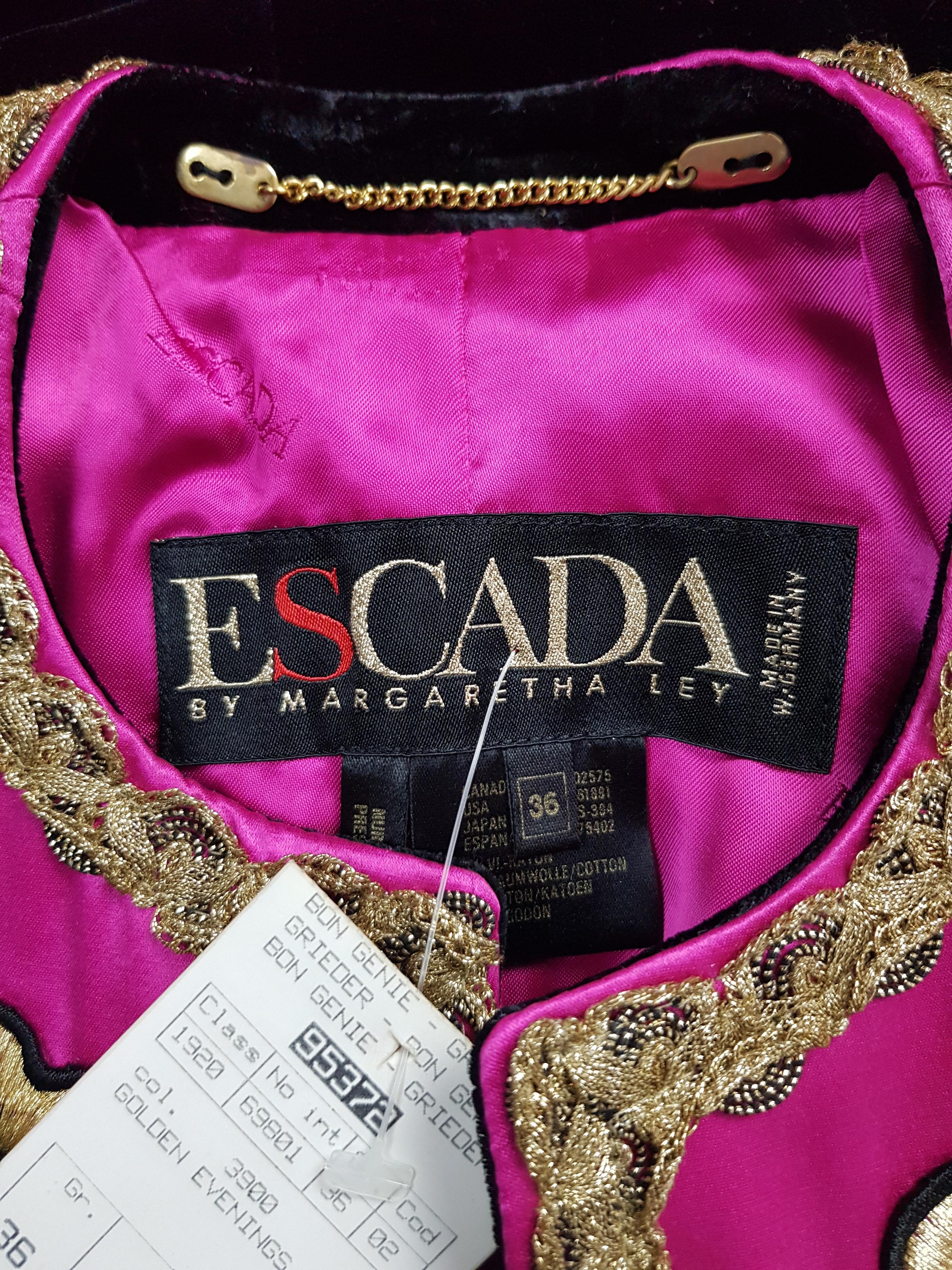 Never worn (with tag and original price 1460 CHF) rare Escada by Margaretha Ley statement velvet jacket with embedded rhinestones. 
Edges of this jacket are elaborated with pink satin fabric embroidered with gold yarn and beautiful