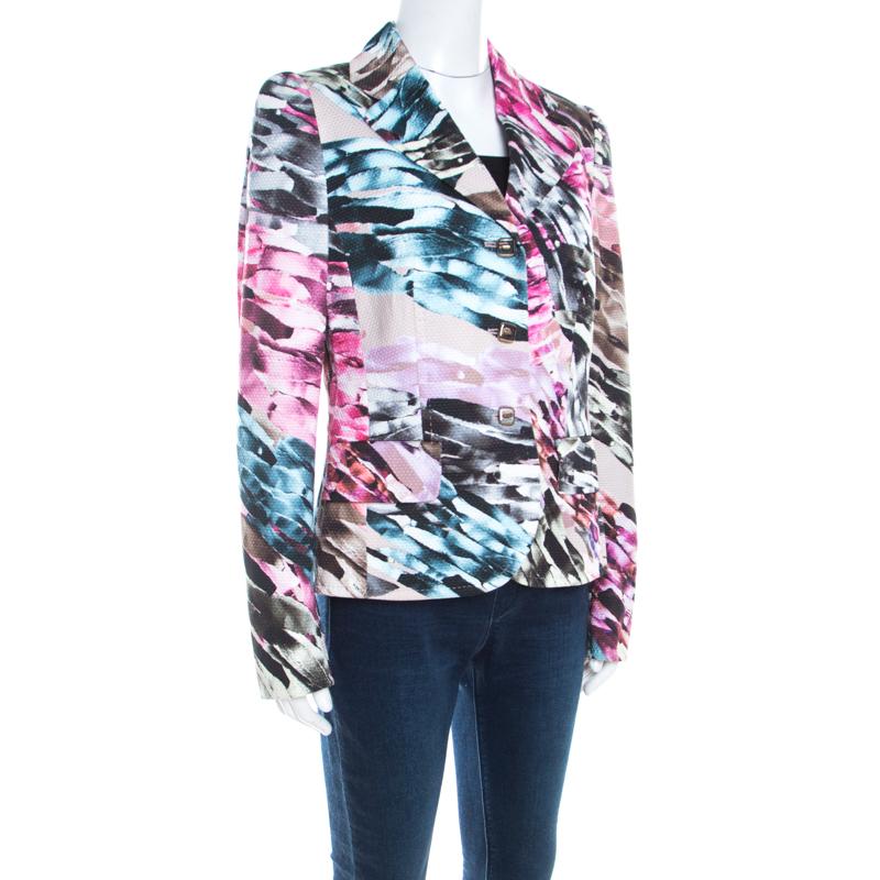 Isn't it a fabulous piece to showcase your style with! Designed in an abstract fantasy print, this multicolor creation surely makes a statement. Created by Escada, this Burka Blazer features two external pockets and a button front
