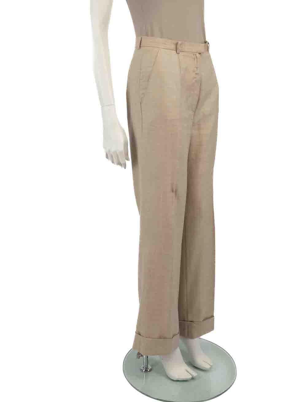 CONDITION is Very good. Minimal wear to trousers is evident. Minimal wear to hem, where there are plucks to the weave and discolouration at the edge on this used Escada designer resale item.
 
 
 
 Details
 
 
 Beige
 
 Cashmere
 
 Trousers
 
