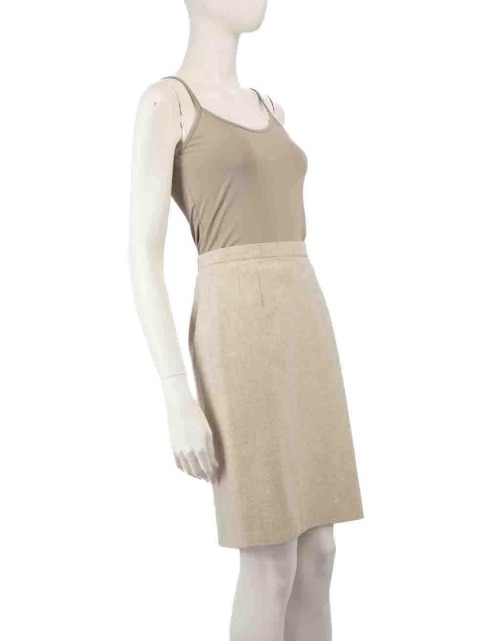 CONDITION is Very good. Hardly any visible wear to skirt is evident on this used Escada designer resale item.
 
 
 
 Details
 
 
 Beige
 
 Wool
 
 Pencil skirt
 
 Knee length
 
 Back button and zip fastening
 
 
 
 
 
 Made in Portugal
 
 
 
