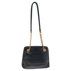 Escada Tote negro de piel con cadena