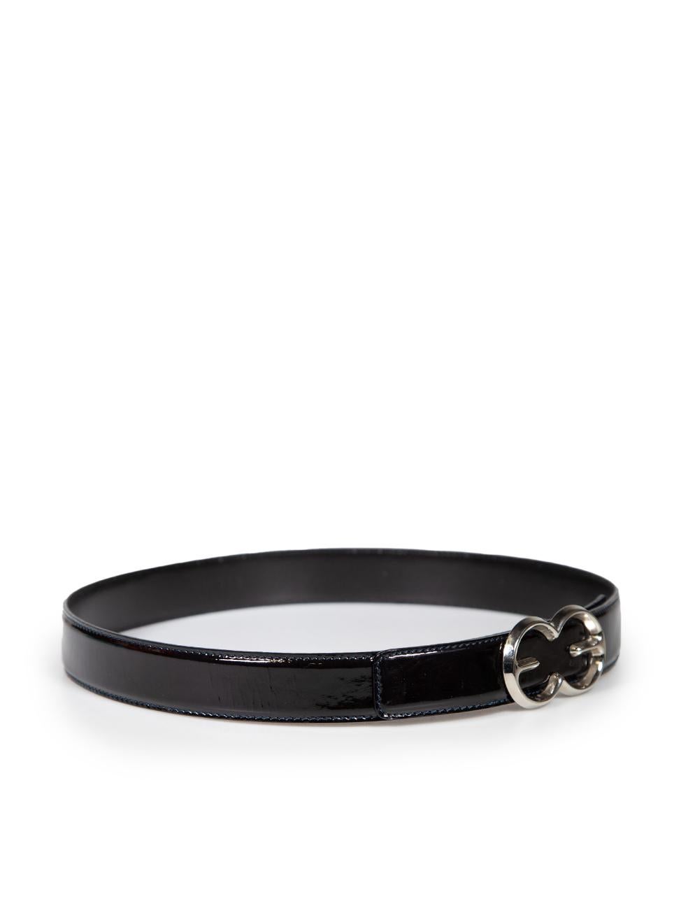 CONDITION is Very good. Minimal wear to belt is evident. Minimal tarnishing to metal buckle on this used Escada designer resale item.
 
 
 
 Details
 
 
 Black
 
 Patent leather
 
 Belt
 
 Silver logo buckle
 
 
 
 
 
 
 
 Composition
 
 EXTERIOR: