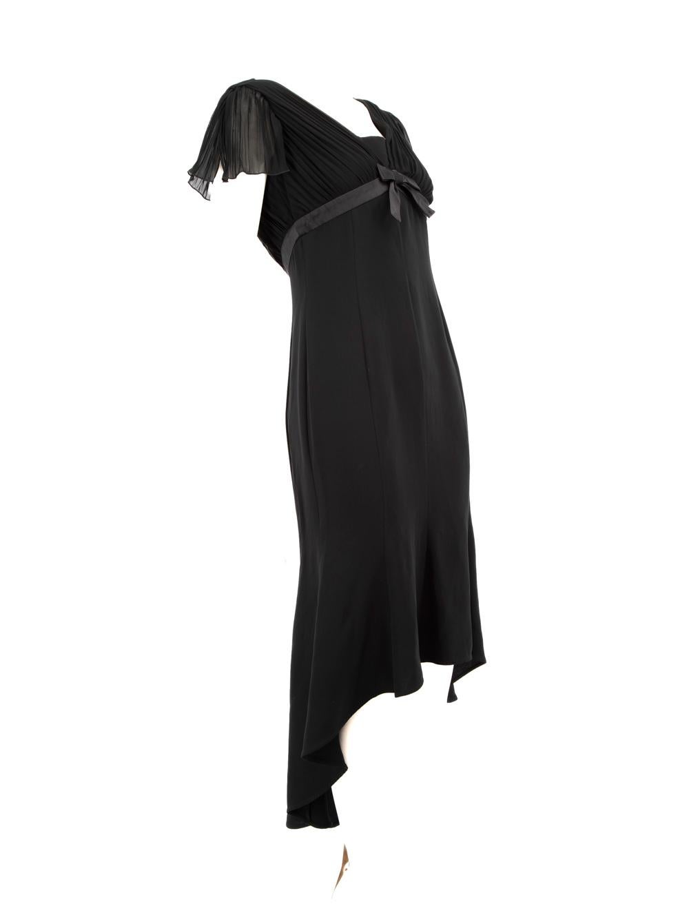 CONDITION is Very good. Minimal wear to the dress is evident. There is mild discolouration on the outside and the lining of the underarms on this used Escada designer resale item.
 Details
 Black
 Silk
 Dress
 Midi
 Short sleeves
 Pleated detail
