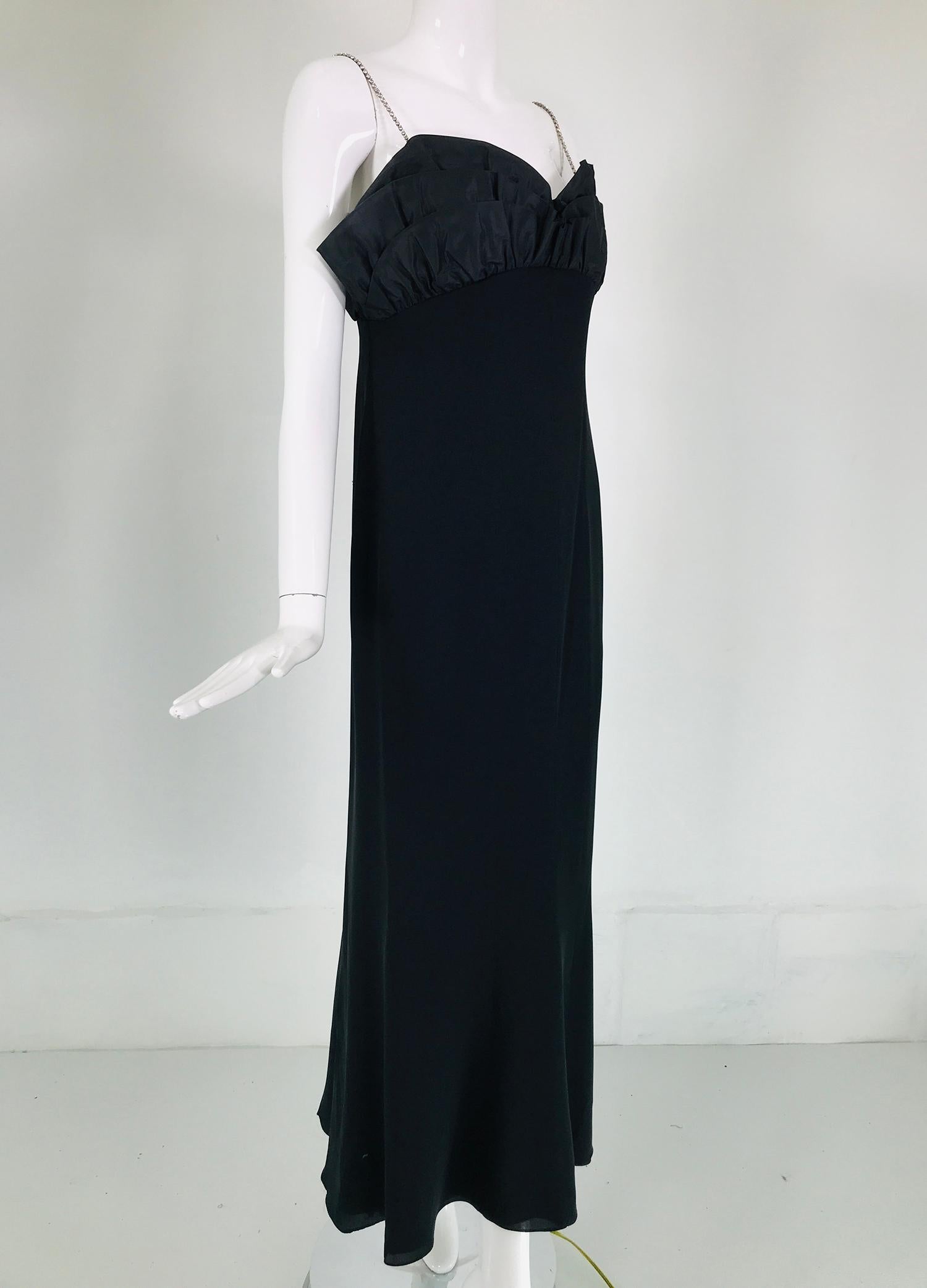 Escada black silk evening dress with rhinestone shoulder straps and a silk taffeta ruffle bodice. This beautiful dress is perfect for any special event. Glittery crystal rhinestones make amazing shoulder straps, the bodice is horizontally pleated