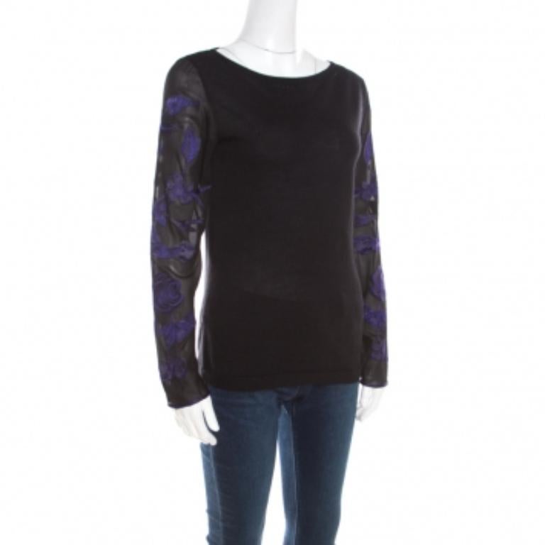 Comfort e stile sono le caratteristiche di questo top Escada. Realizzato in un pregiato tessuto misto, il top nero è caratterizzato da maniche lunghe con dettagli floreali a contrasto. Vale davvero la pena di spendere tanto!