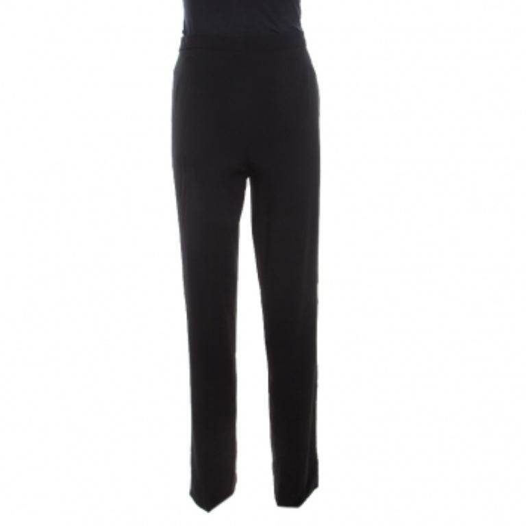 Per un look elegante, scegli questi pantaloni neri Tovah di Escada. Il modello contemporaneo a vita alta cade con gambe accuratamente tagliate e offre una vestibilità comoda. Dotati di chiusura a zip, questi pantaloni in misto tessuto possono essere