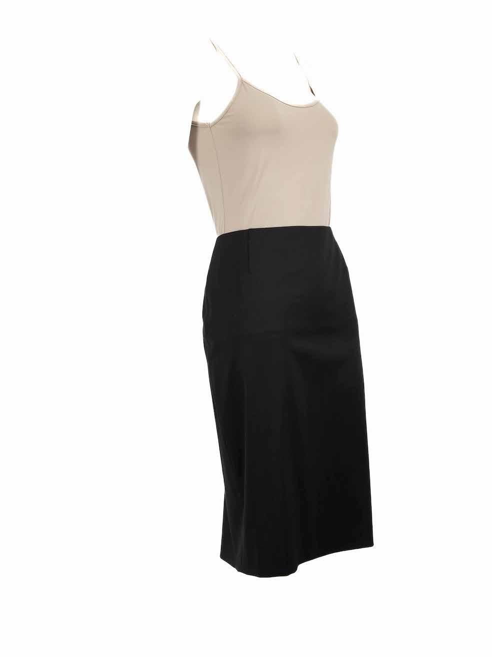 CONDITION is Very good. Hardly any visible wear to skirt is evident on this used Escada designer resale item.
 
 
 
 Details
 
 
 Black
 
 Wool
 
 Skirt
 
 Knee length
 
 Straight fit
 
 Back zip and button fastening
 
 
 
 
 
 Made in Slovenia
 
 
